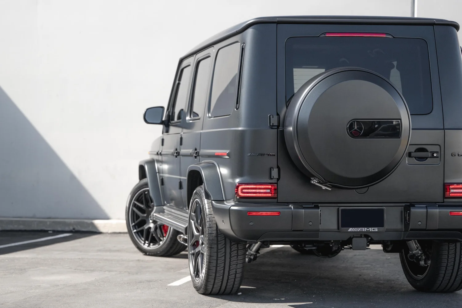 Charcoal Grey Mercedes-AMG G 63 after Matte PPF, Window Tint and Ceramic Coating, low-angle rear view