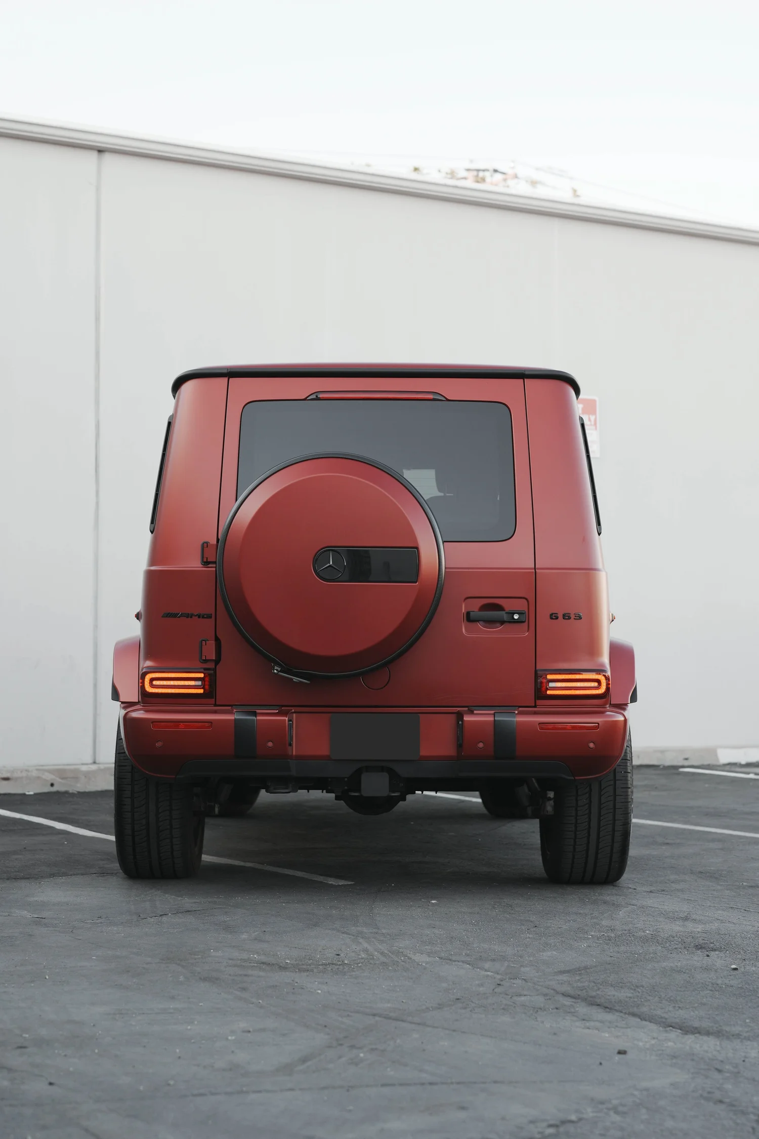 Red Mercedes-AMG G 63 after Matte PPF, Window Tint and Ceramic Coating, direct rear view