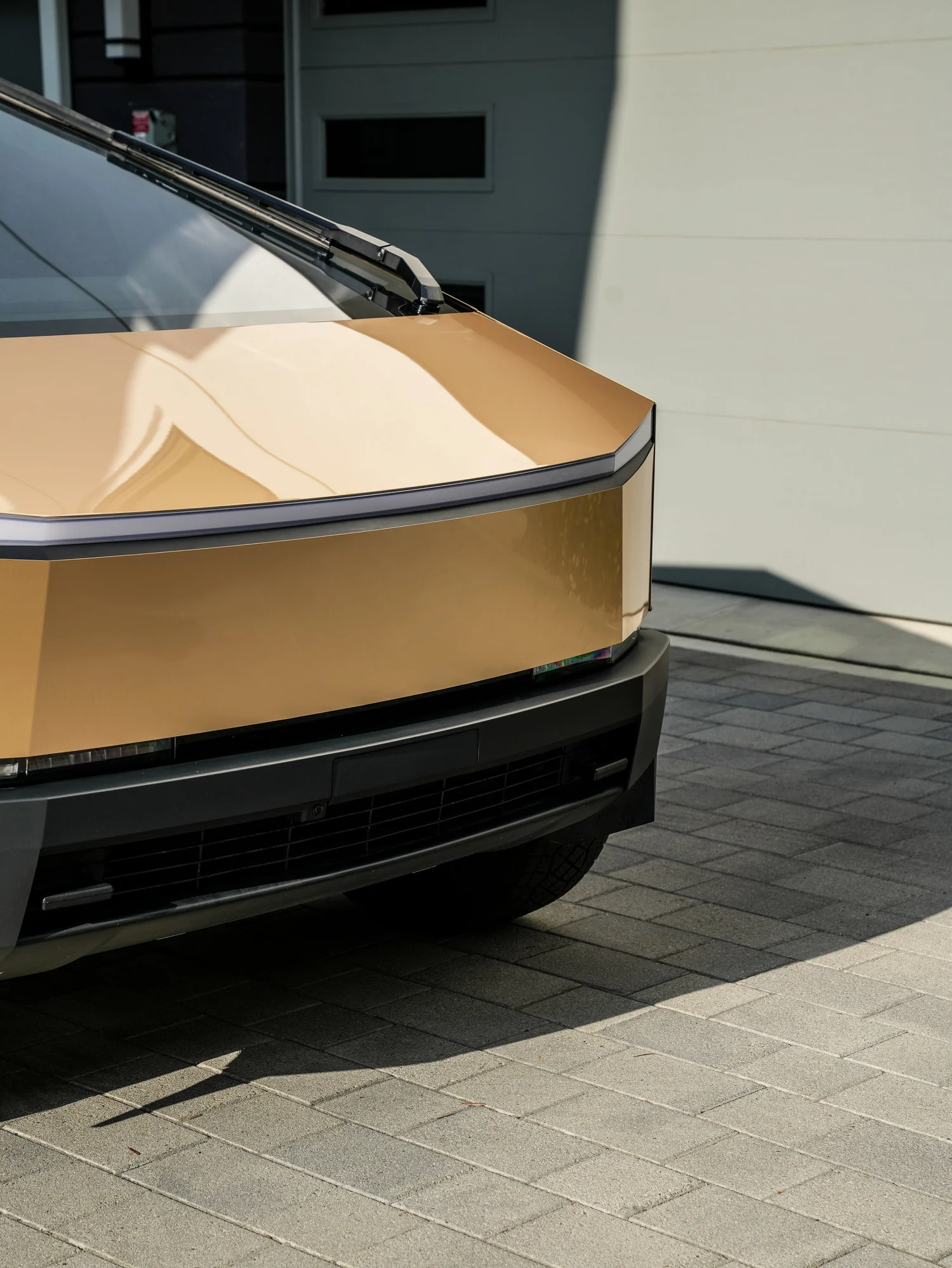 Tesla Cybertruck Milan Gold after Paint Protection Film (PPF) and Window Tint, front-corner view