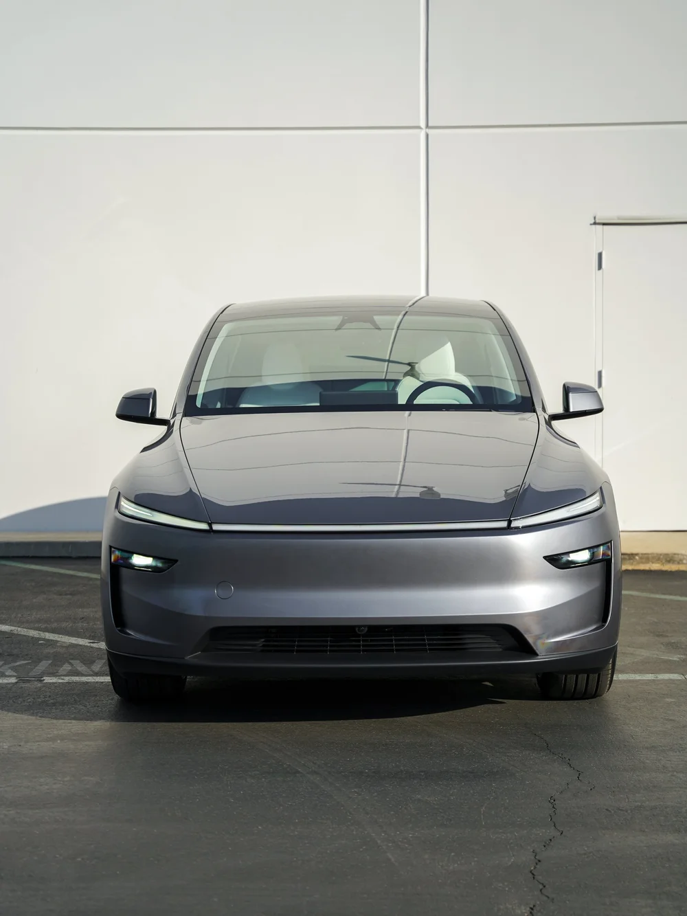 Tesla Model Y ceramic coating and paint protection project completed by Toyz Detail Studio.