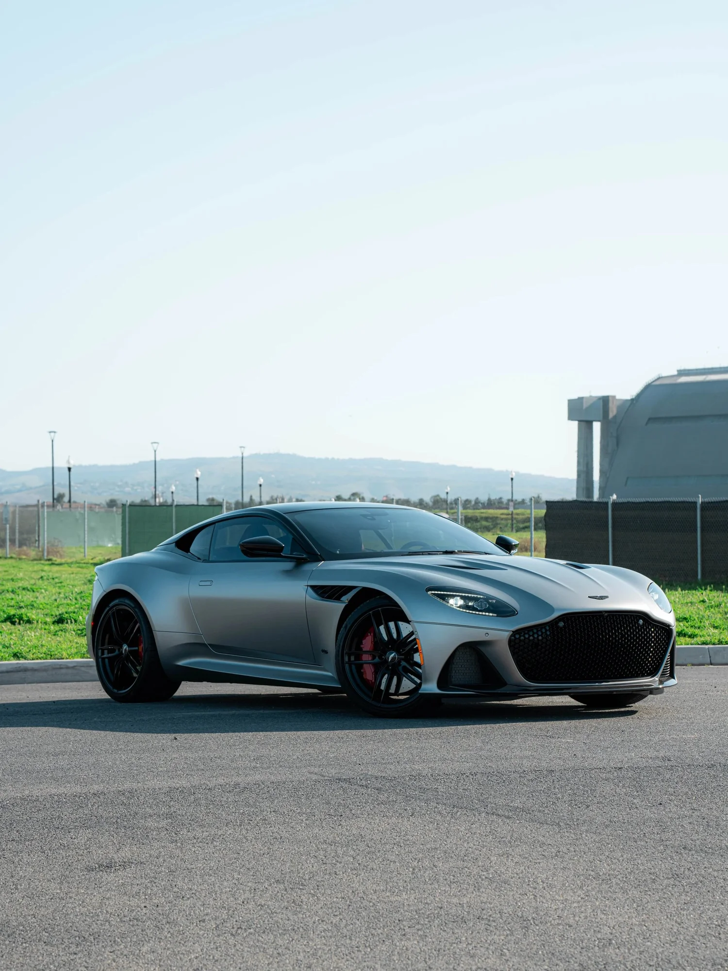 Aston Martin DBS after Matte PPF, Window Tint and Ceramic Coating, front-left three-quarter view