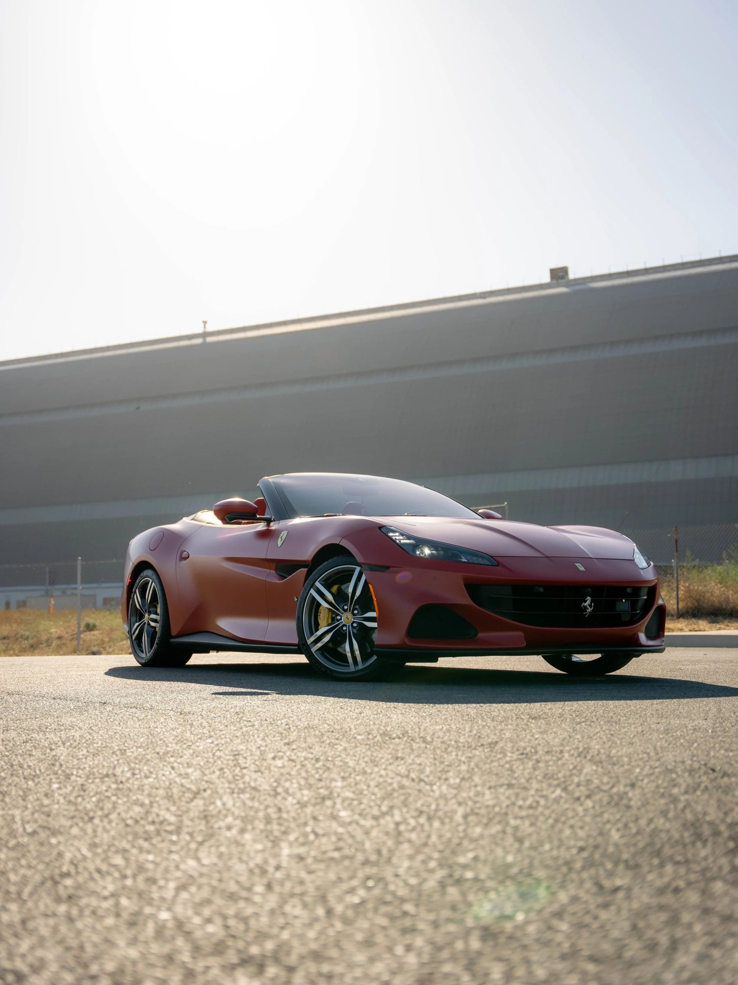 Ferrari Portofino after Matte PPF, Window Tint and Ceramic Coating, low-angle front view