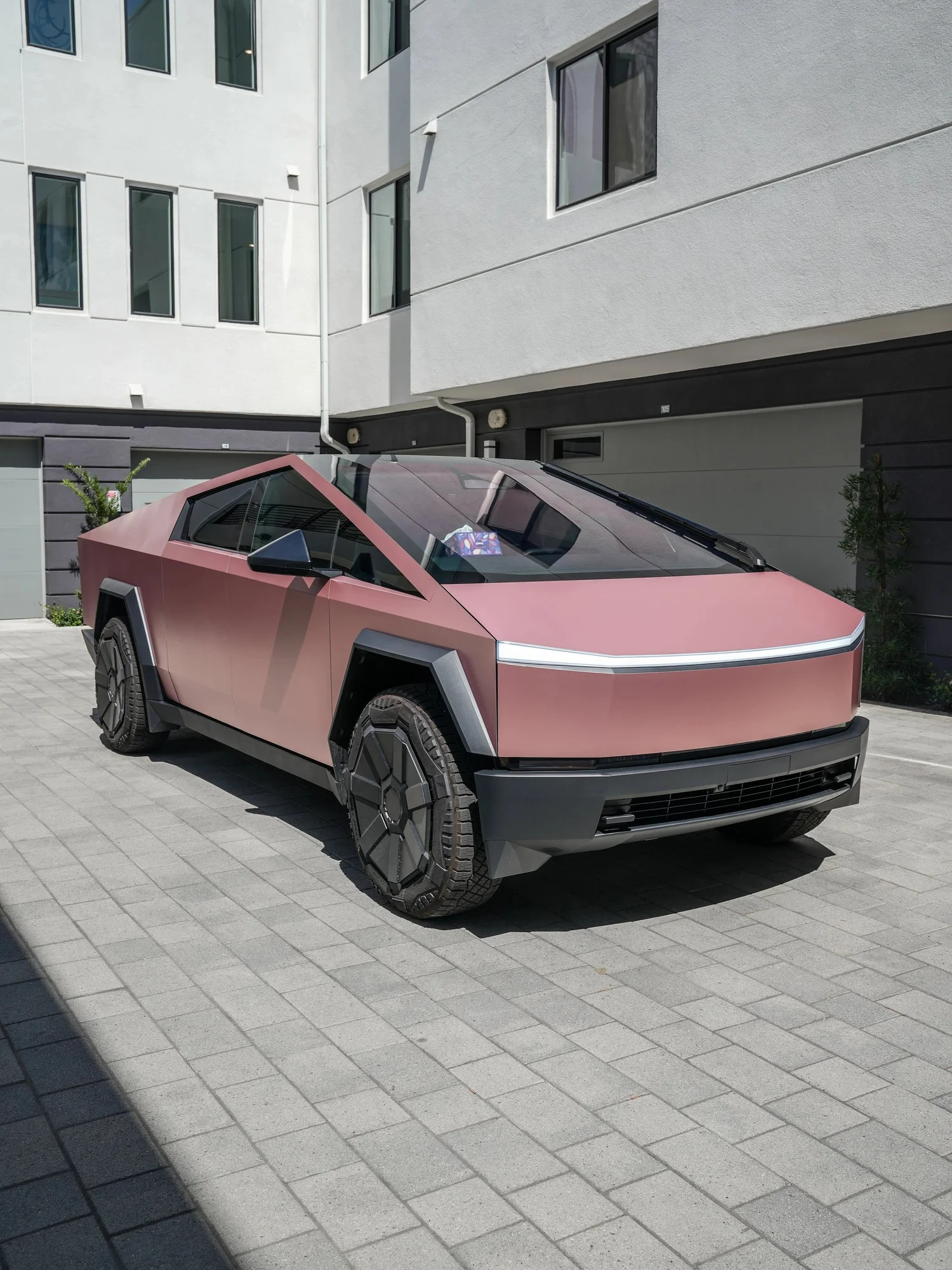 Tesla Cybertruck Matte Champagne Gold after Vinyl Wrap, front-left three-quarter view