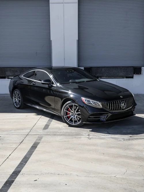 Black Mercedes-Benz S-Class coupe, front three-quarter view