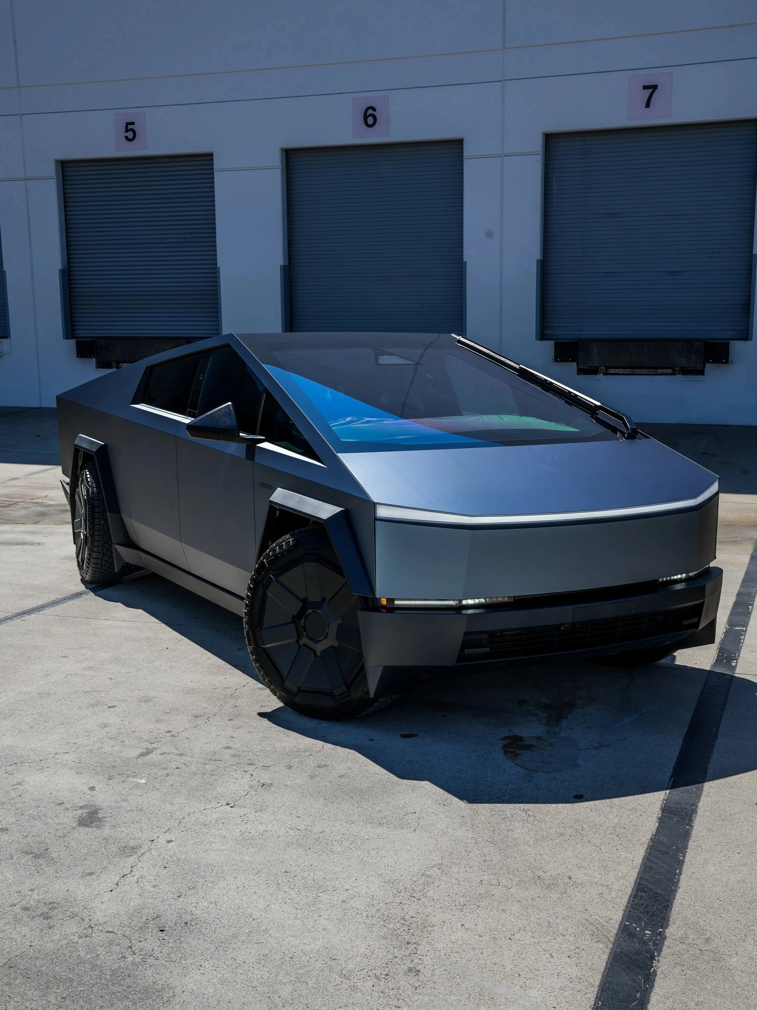 Tesla Cybertruck Ghost Metal Grey Blue after window tint and vinyl wrap in Irvine