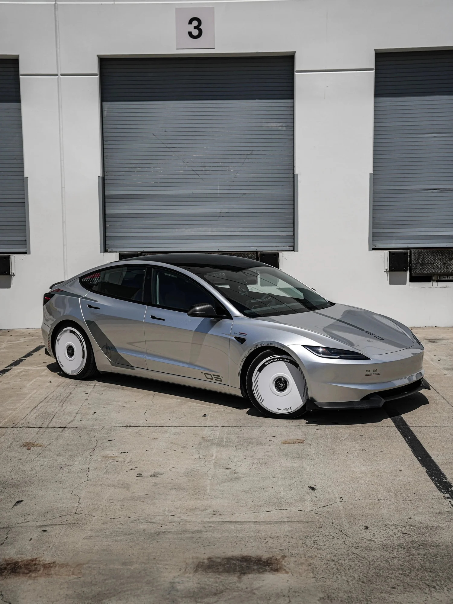 Tesla Model 3 Halo Edition Custom Wrap after Vinyl Wrap, front-left three-quarter view