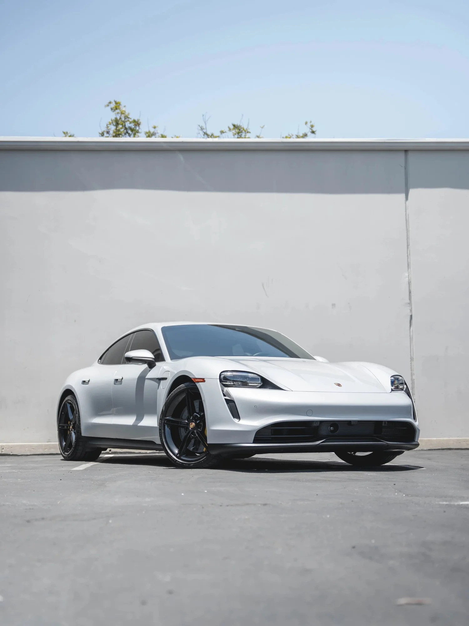 Porsche Taycan after Paint Protection Film (PPF), Window Tint and Ceramic Coating, front-right three-quarter view