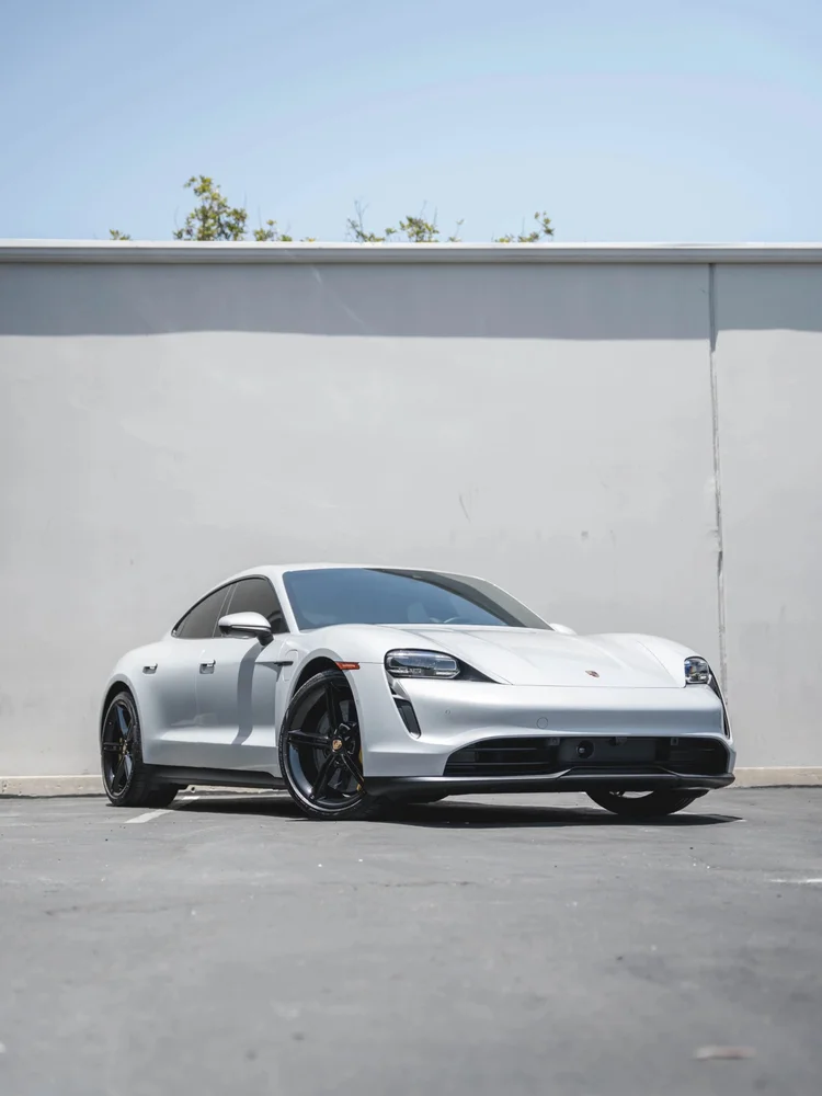 Porsche Taycan in its retained project-cover photograph.