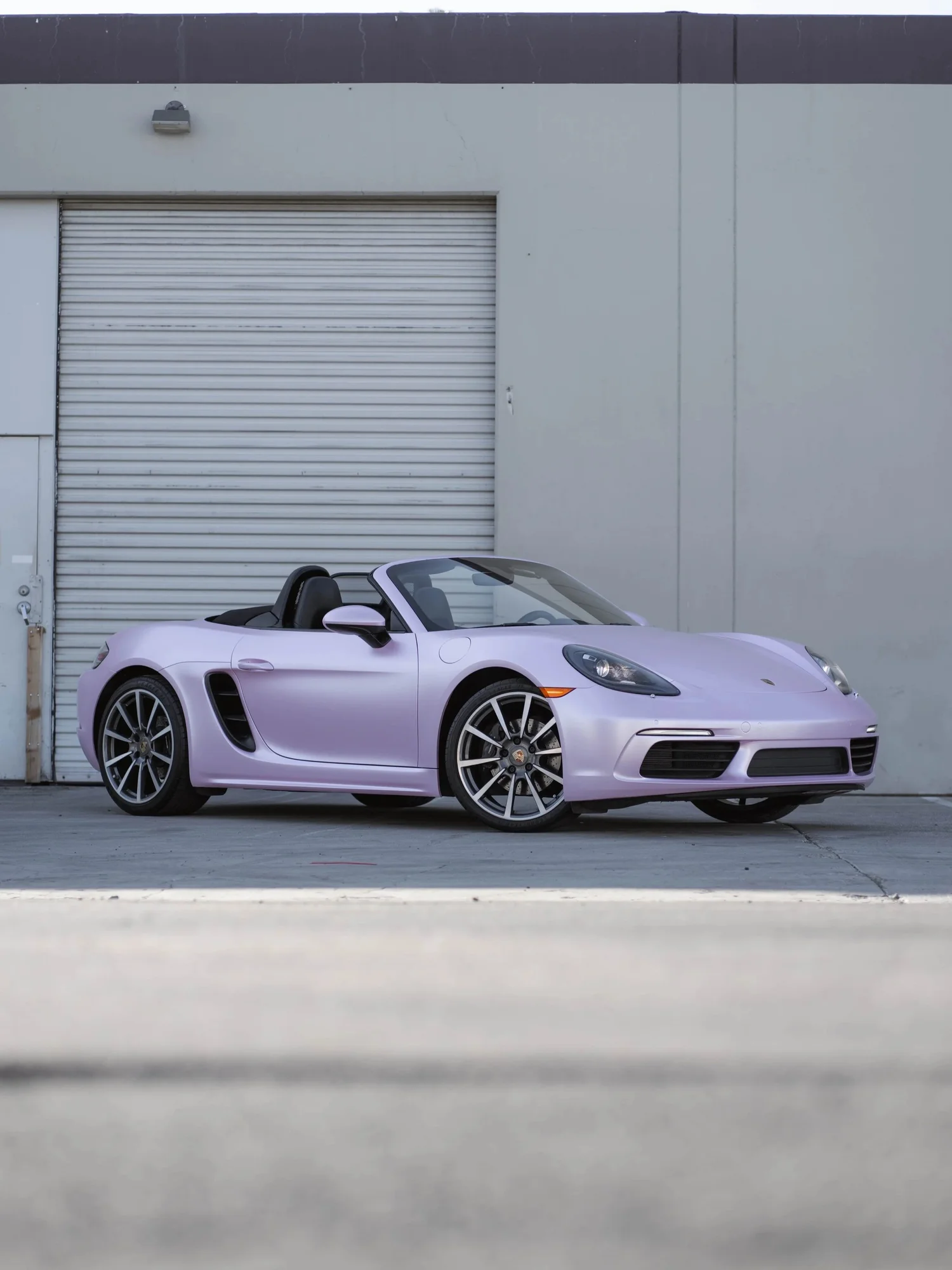 Porsche 718 Boxster Matte Purple Pink after Vinyl Wrap, front-left three-quarter view