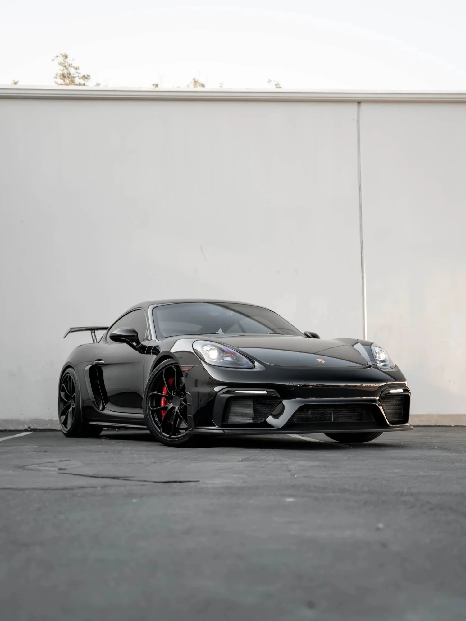 Porsche 718 Cayman GT4 after Paint Protection Film (PPF), Window Tint and Ceramic Coating, front-left three-quarter view