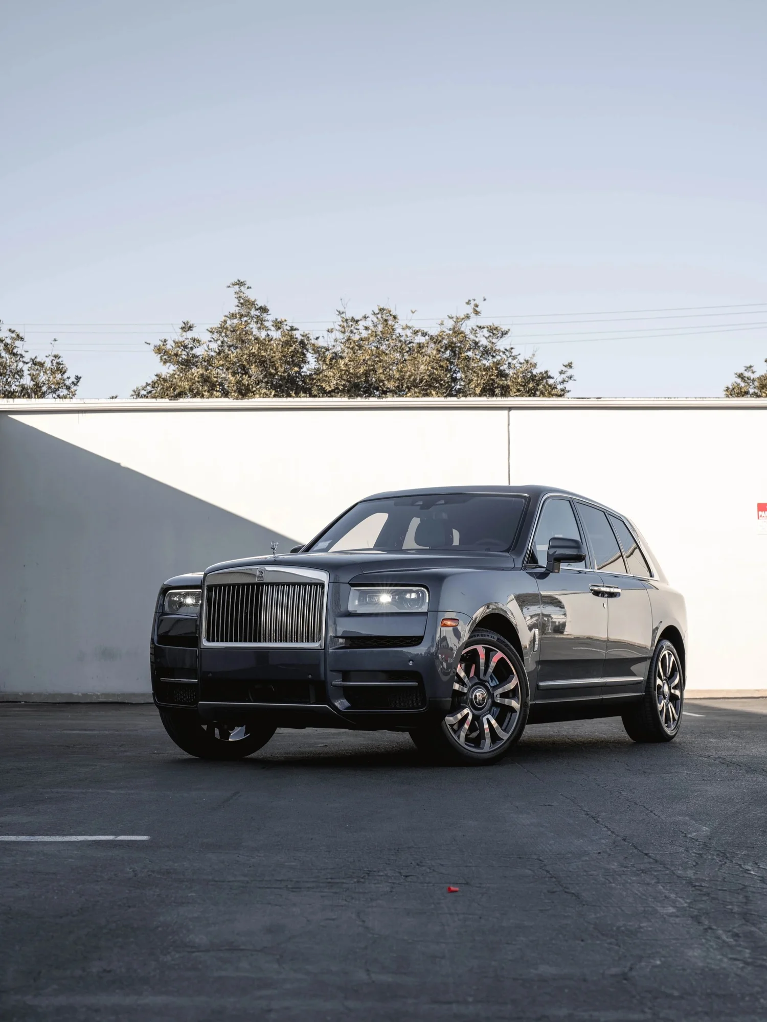 Dark Blue Rolls-Royce Cullinan after Paint Protection Film (PPF), Window Tint and Ceramic Coating, front-left three-quarter view