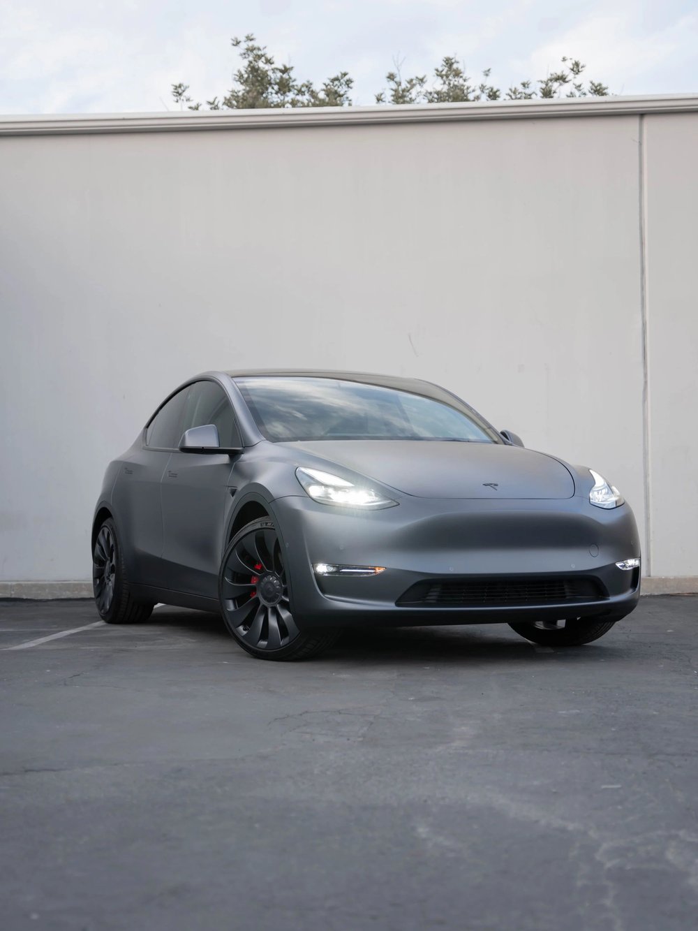 Tesla Model Y AMG Matte Grey Vinyl Wrap & Window Tint — AMG Matte Grey Vinyl Wrap · Window Tint
