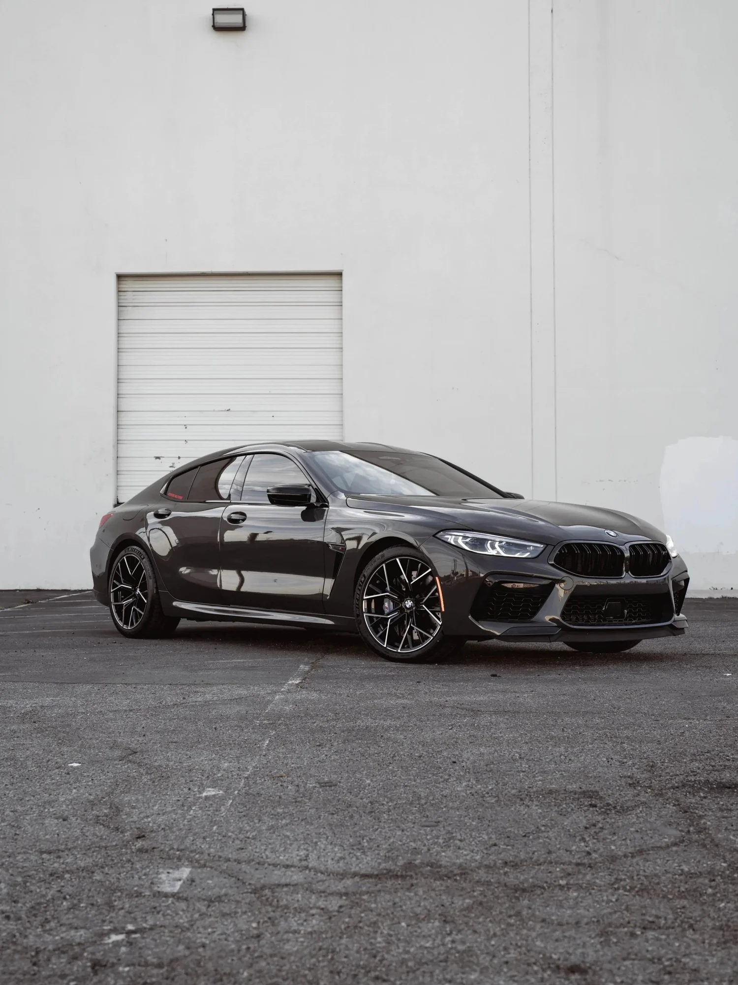 BMW M8 after Paint Protection Film (PPF), Window Tint and Ceramic Coating, front-left three-quarter view