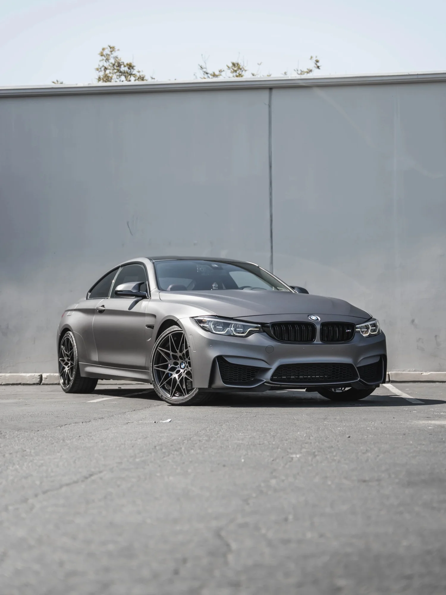 BMW M4 Matte Grey after Vinyl Wrap, front-left three-quarter view