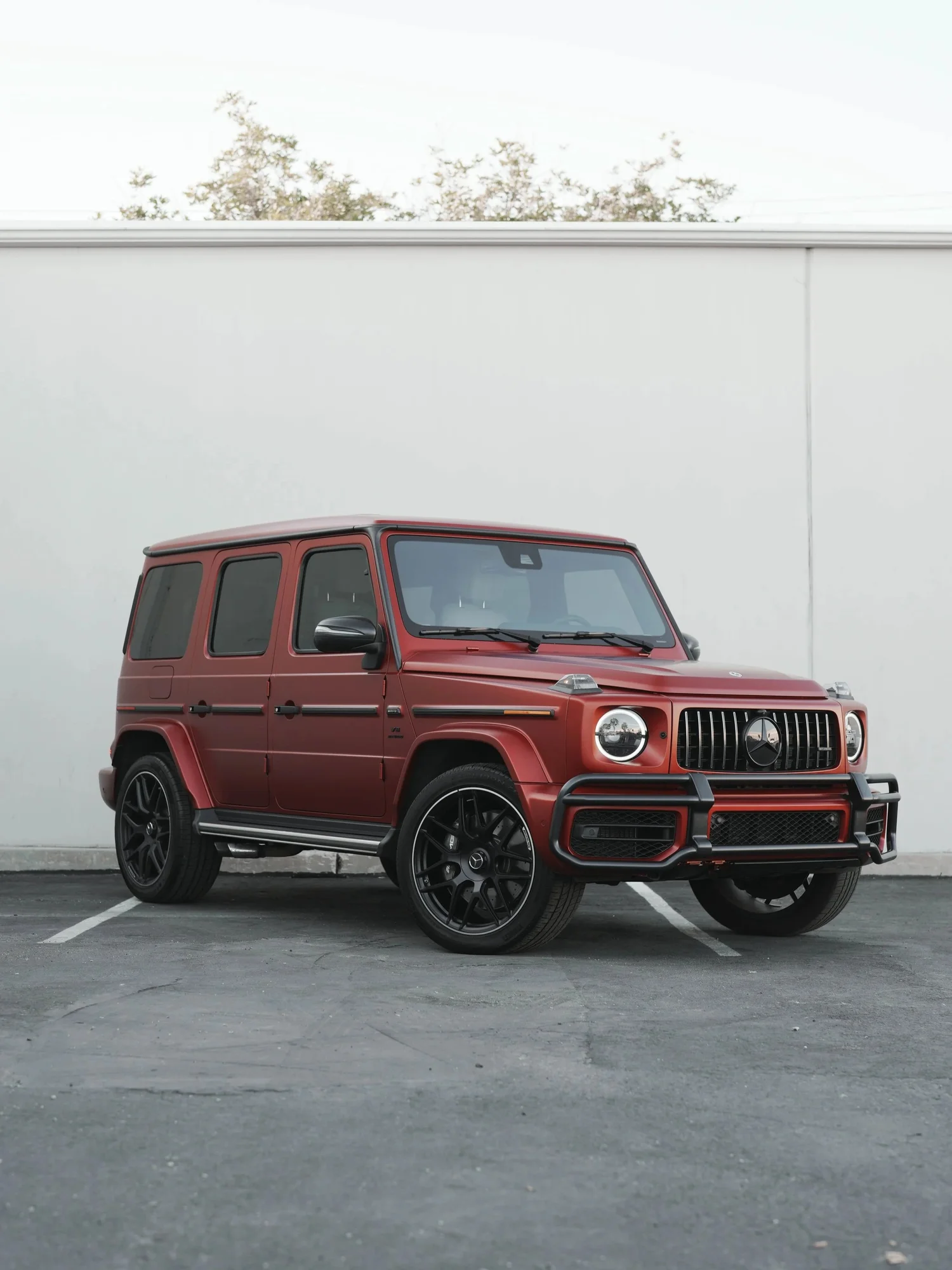 Red Mercedes-AMG G 63 after Matte PPF, Window Tint and Ceramic Coating, front-left three-quarter view