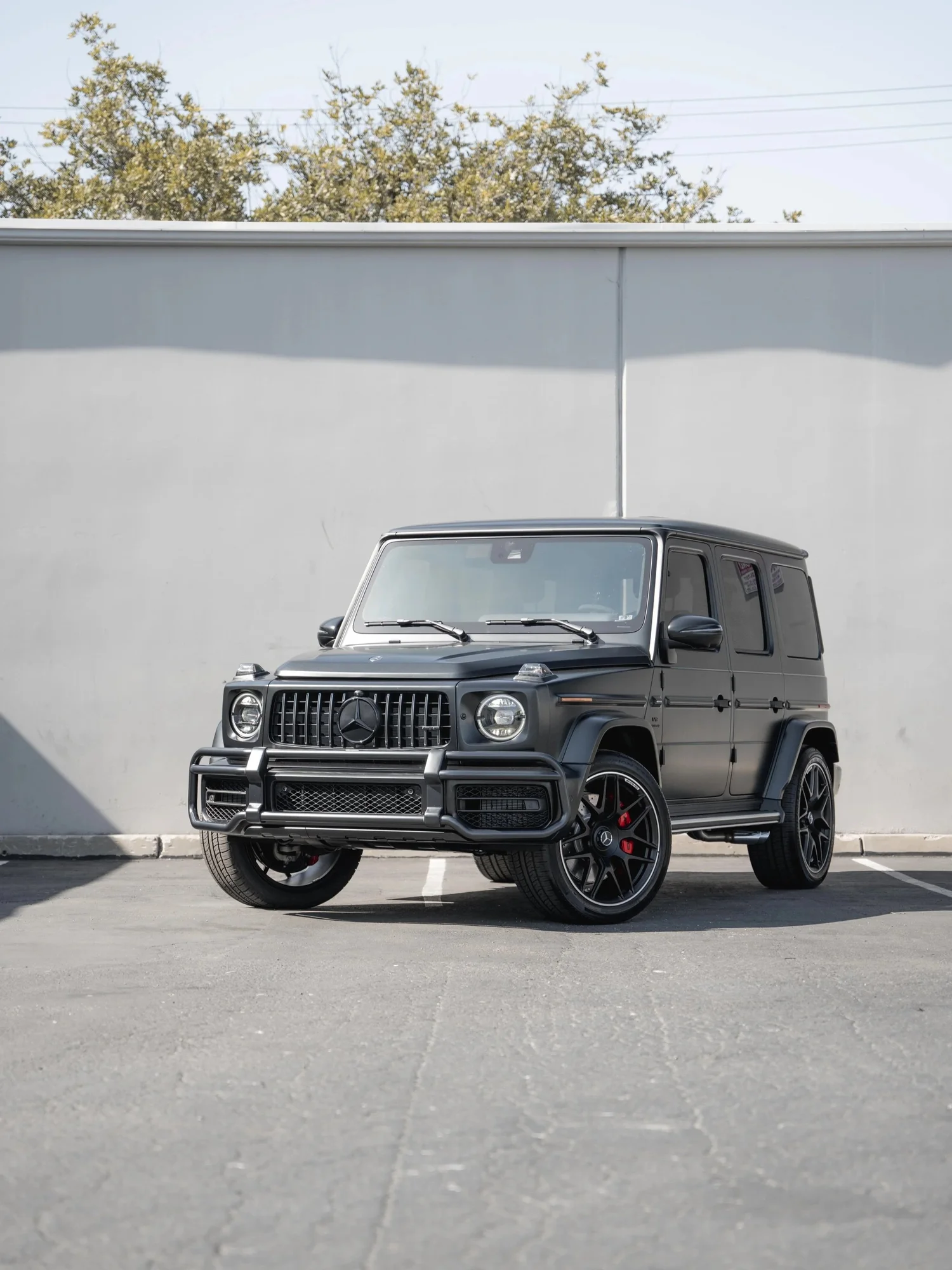 Charcoal Grey Mercedes-AMG G 63 after Matte PPF, Window Tint and Ceramic Coating, front-left three-quarter view