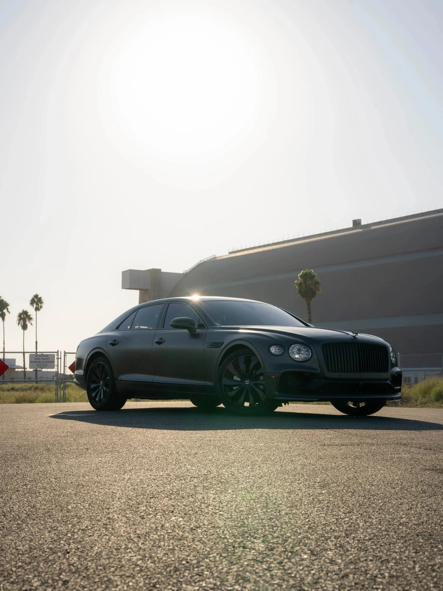 Bentley Flying Spur after Paint Protection Film (PPF), Window Tint and Ceramic Coating, wide outdoor view