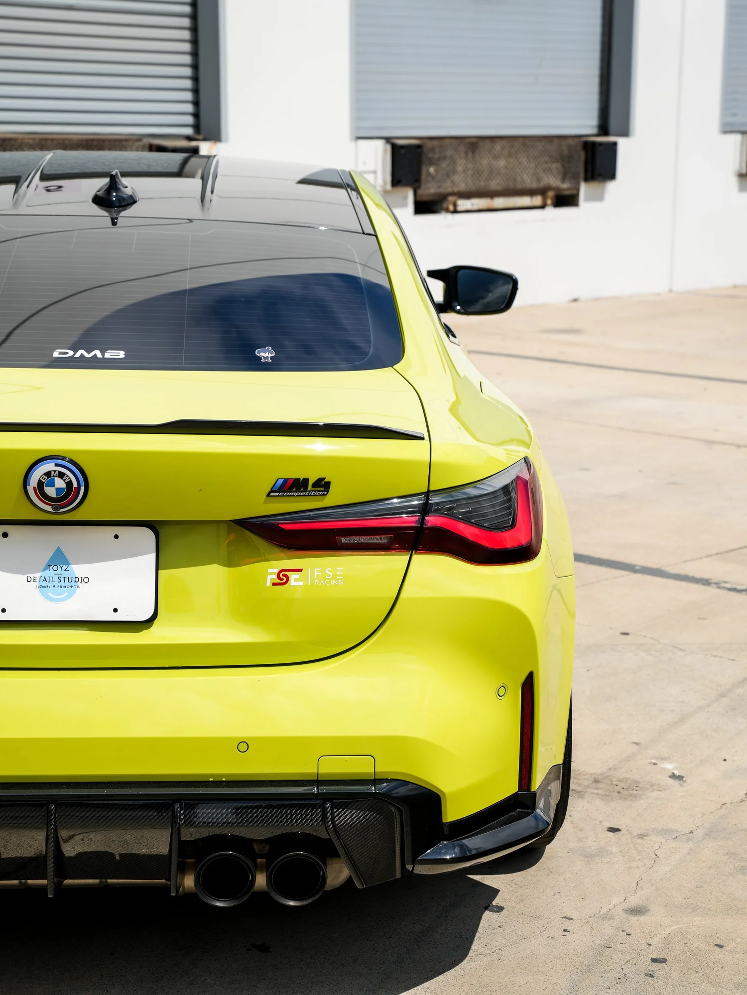 BMW M4 after Paint Protection Film (PPF), rear body and taillight view