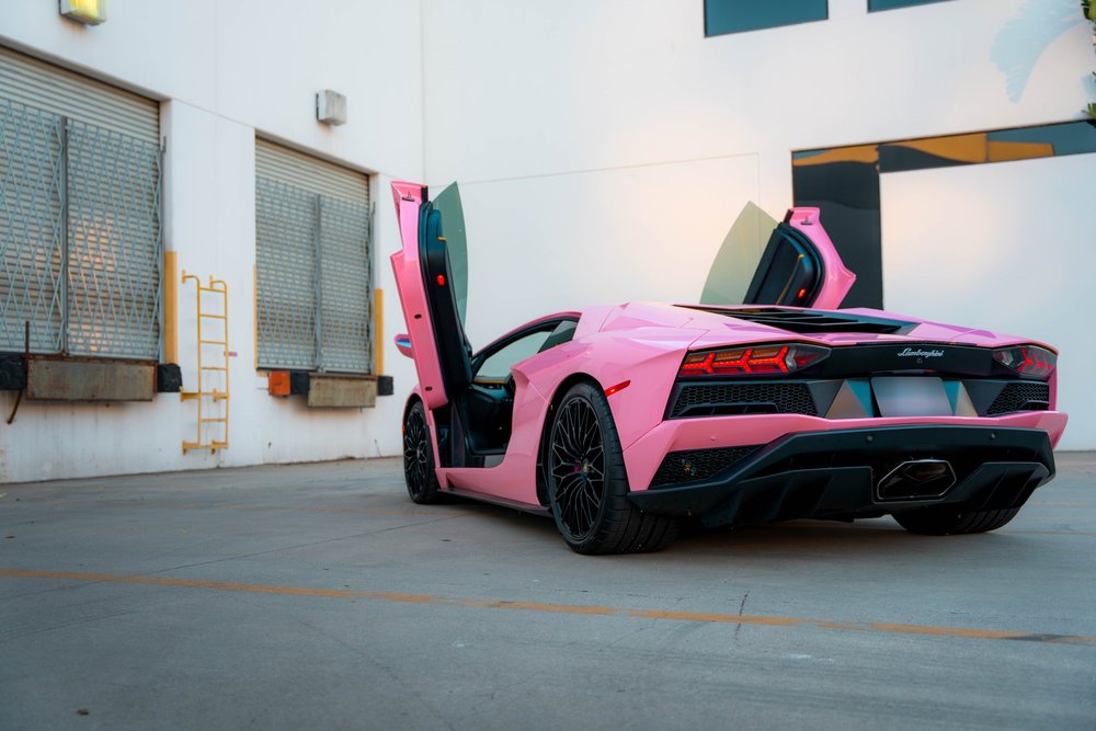 Lamborghini Aventador rear view with scissor doors raised