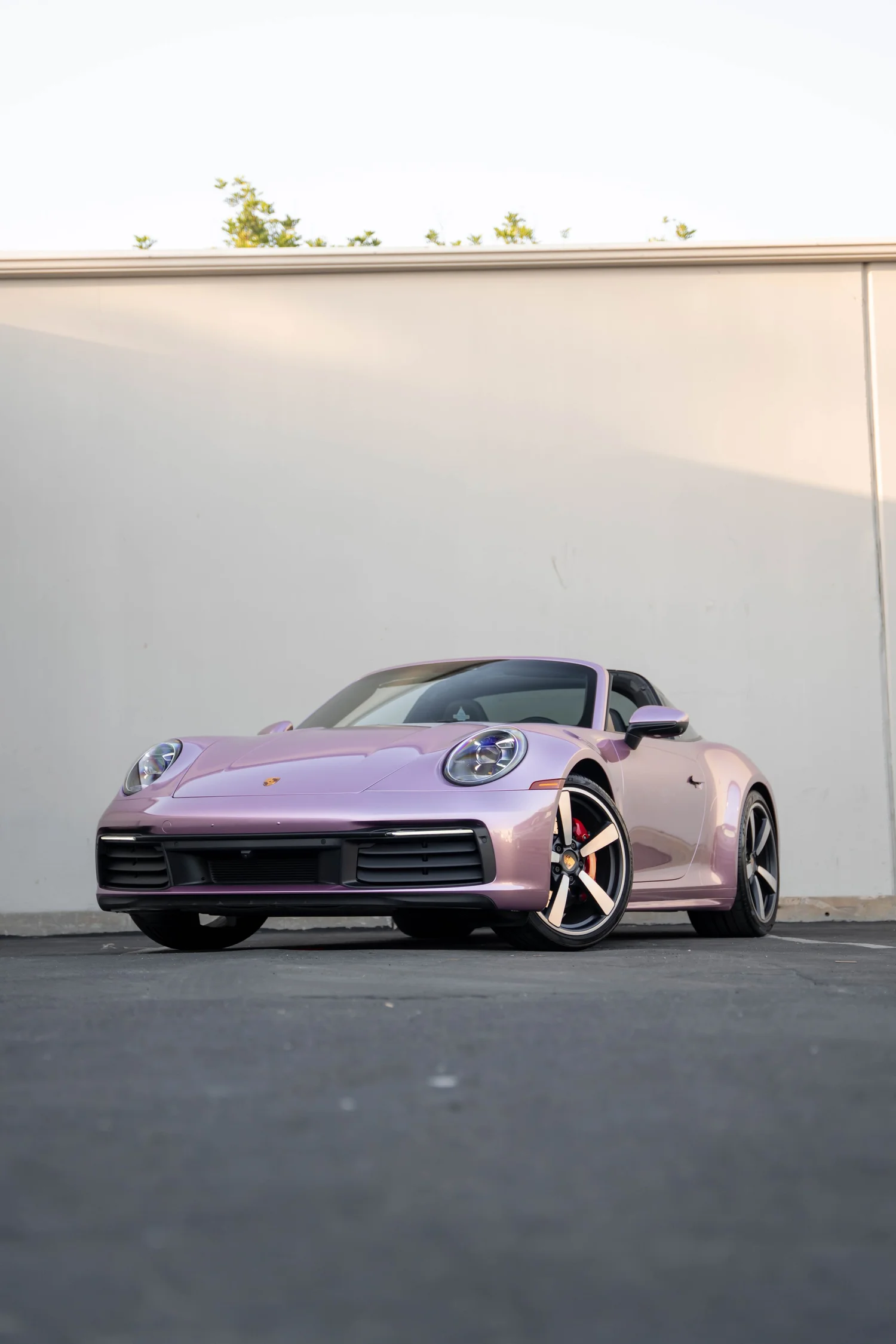 Porsche 911 Metallic Pink after Vinyl Wrap, front-left three-quarter view