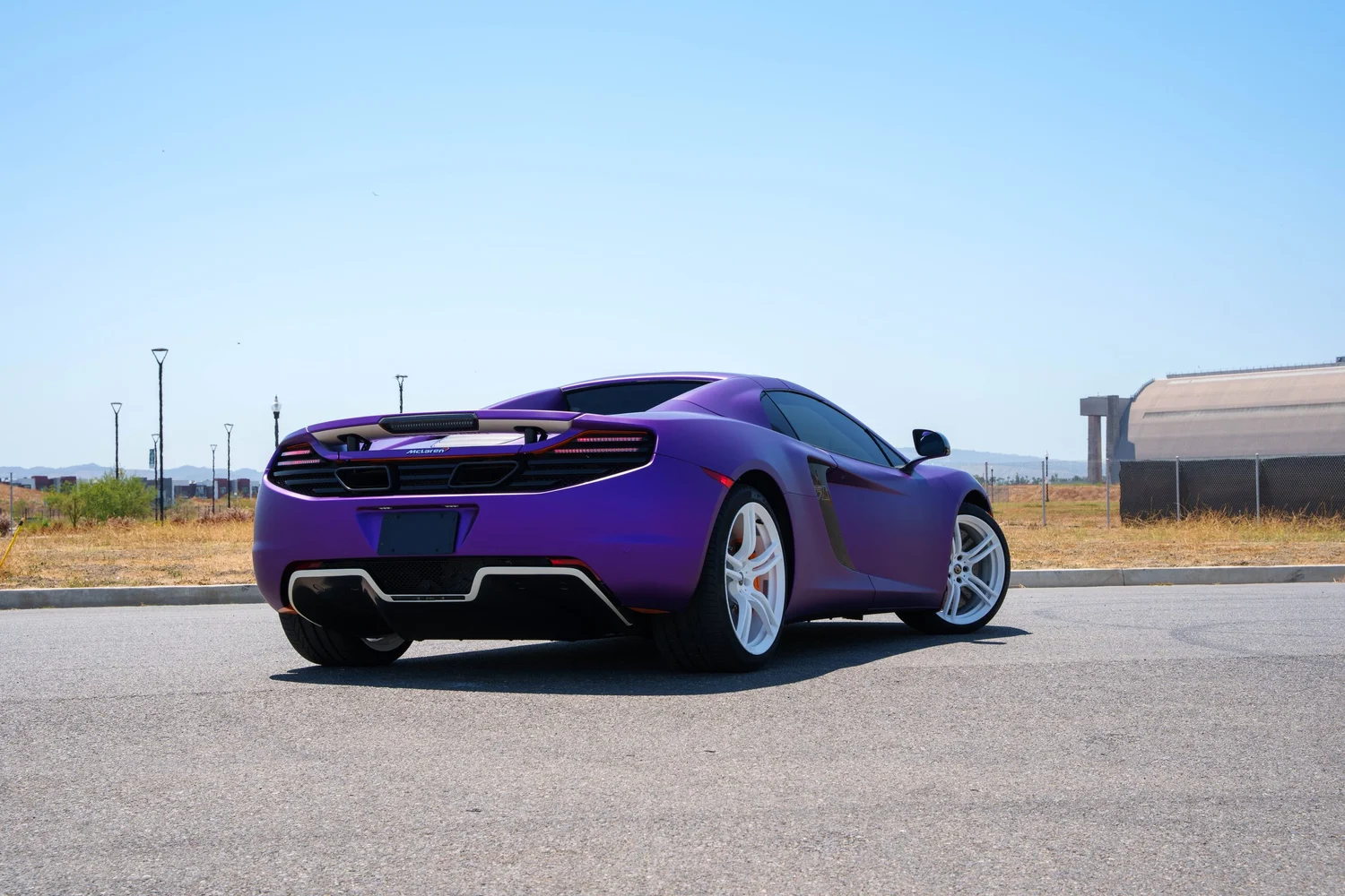 McLaren MP4-12C after Vinyl Wrap, rear-left three-quarter view