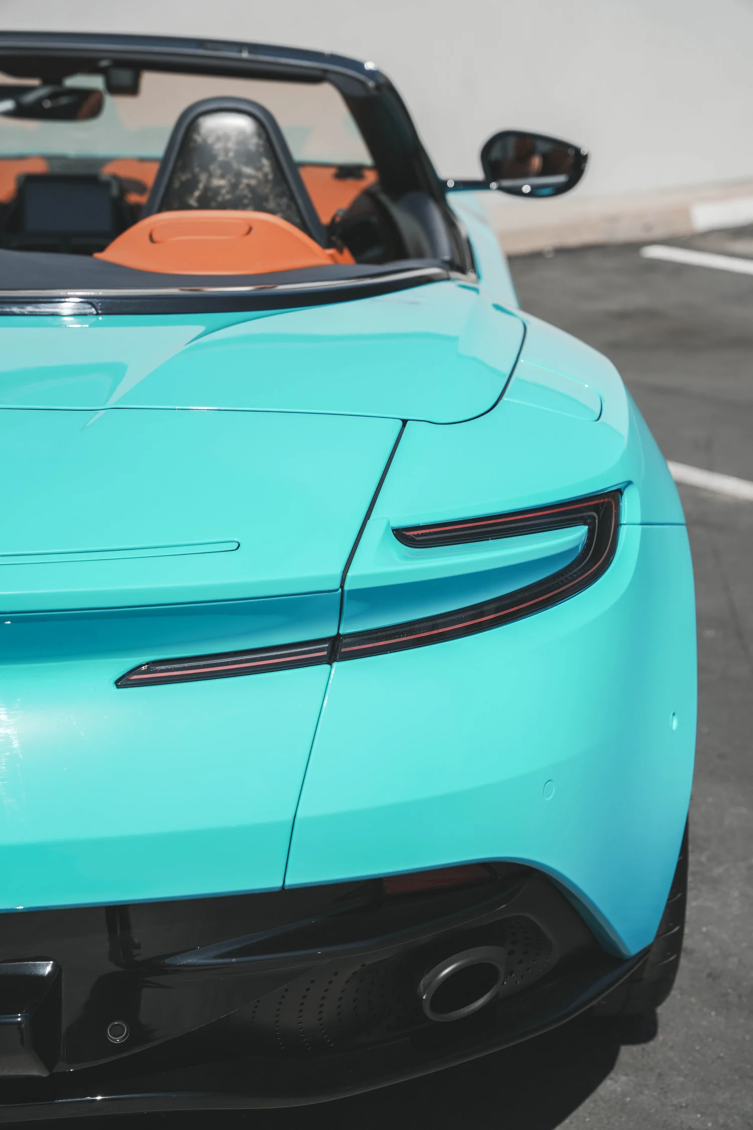 Aston Martin DB11 Miami Blue after Vinyl Wrap, front-corner view