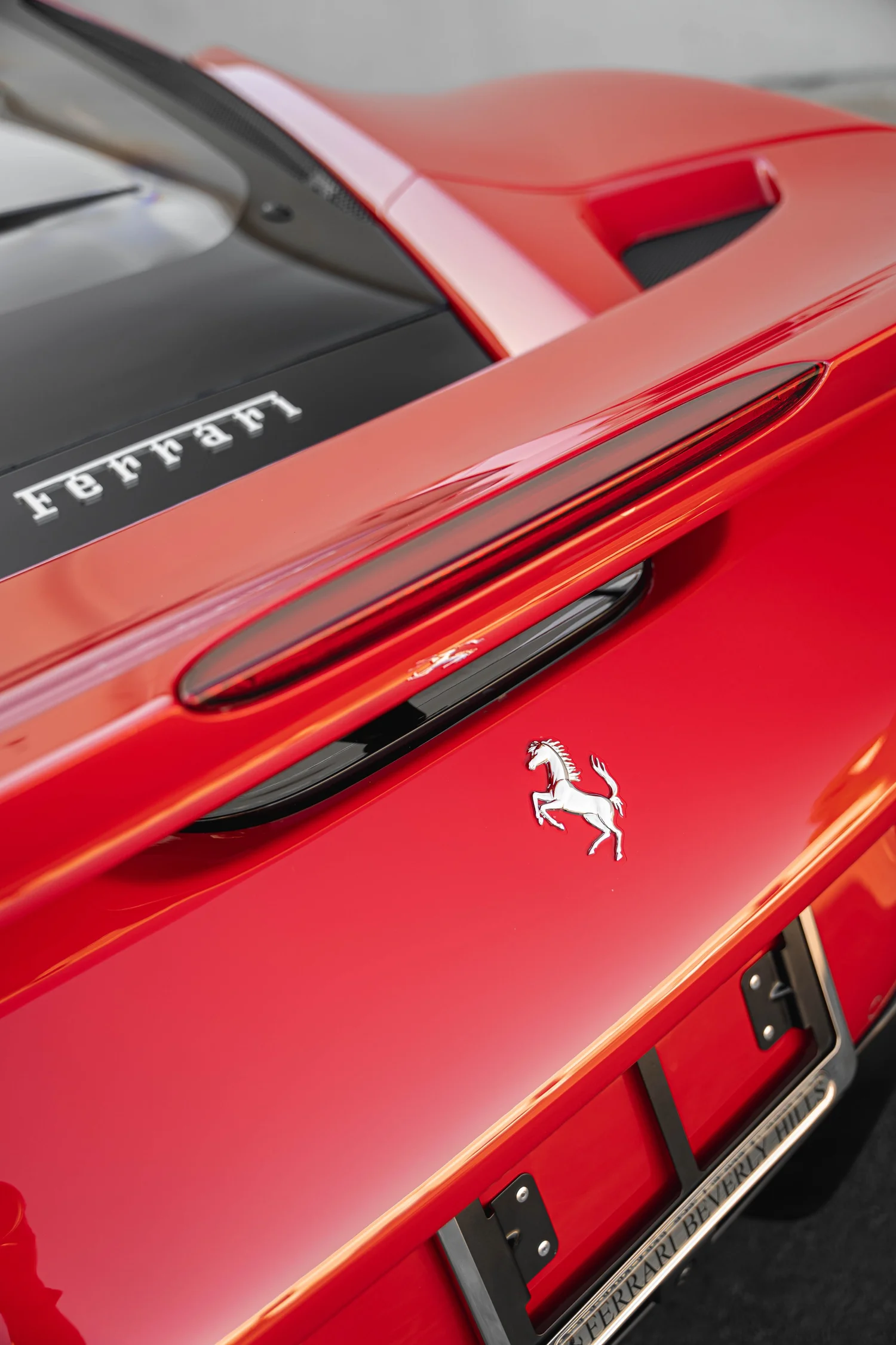 Rosso Corsa Ferrari F8 after Paint Protection Film (PPF), Window Tint and Ceramic Coating, badge and emblem detail