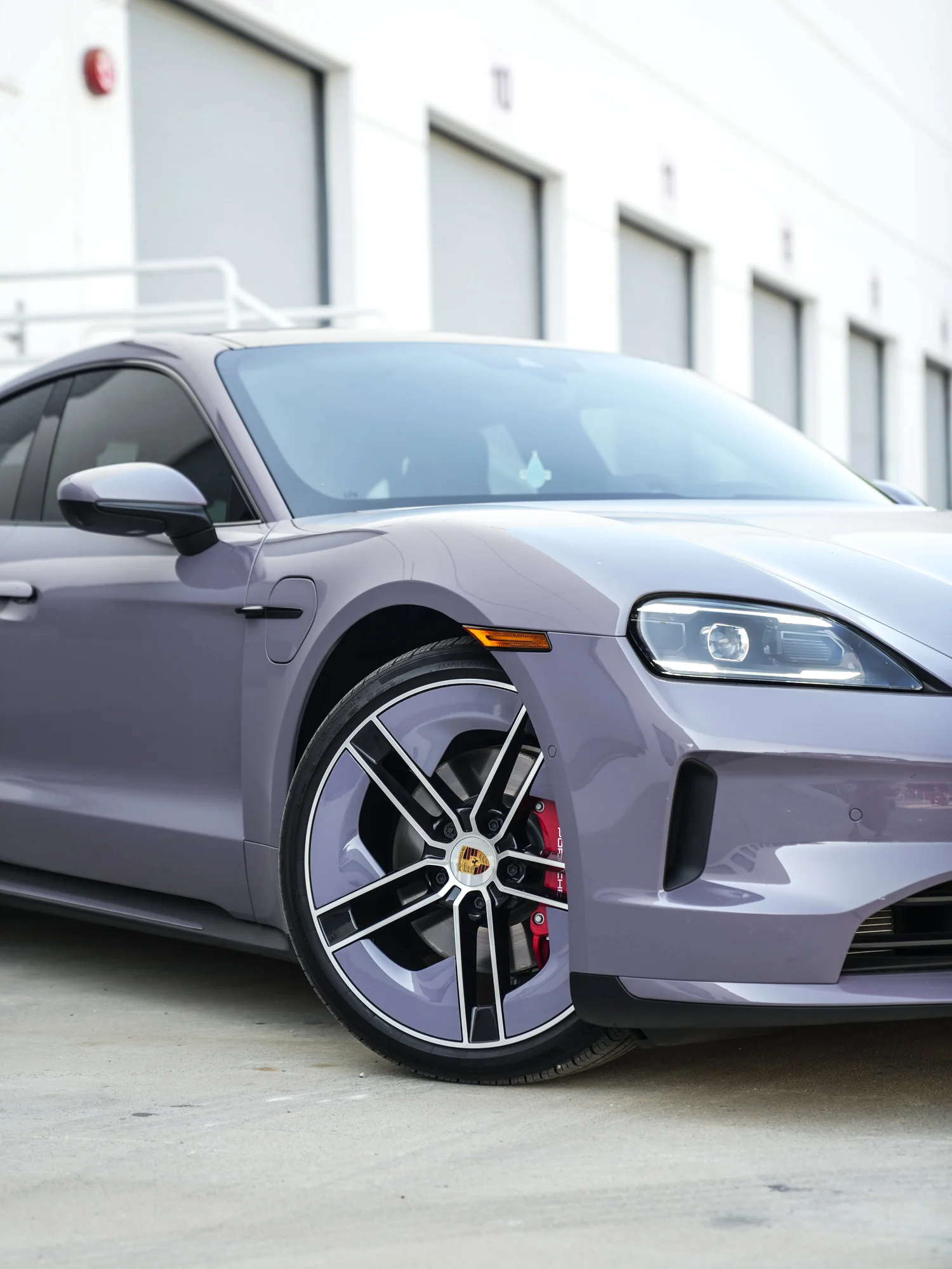 Porsche Taycan front wheel and fender detail
