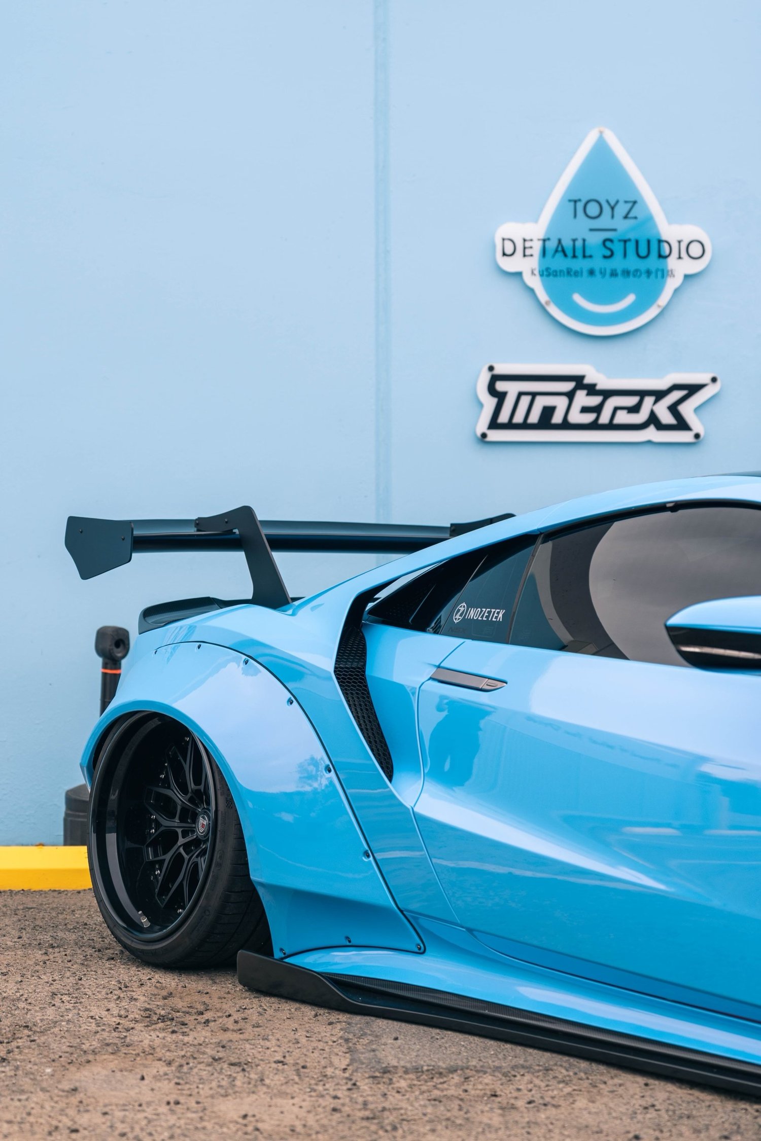 Blue vinyl-wrapped Nissan GT-R parked outside Toyz Detail Studio in Irvine