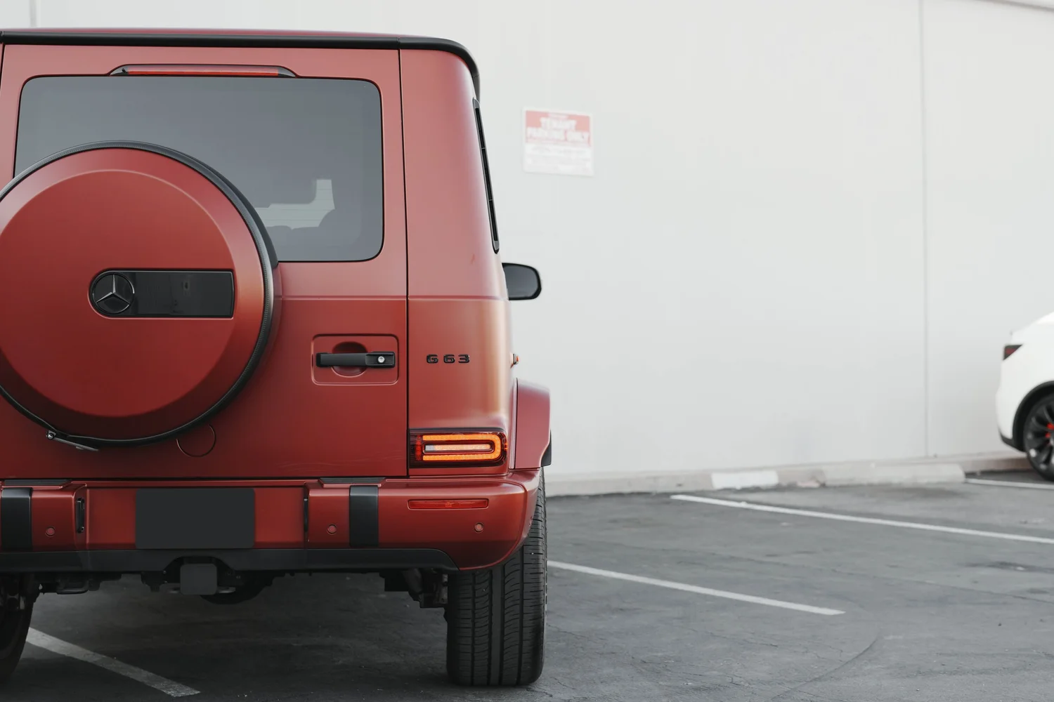 Red Mercedes-AMG G 63 after Matte PPF, Window Tint and Ceramic Coating, rear-quarter and wheel view