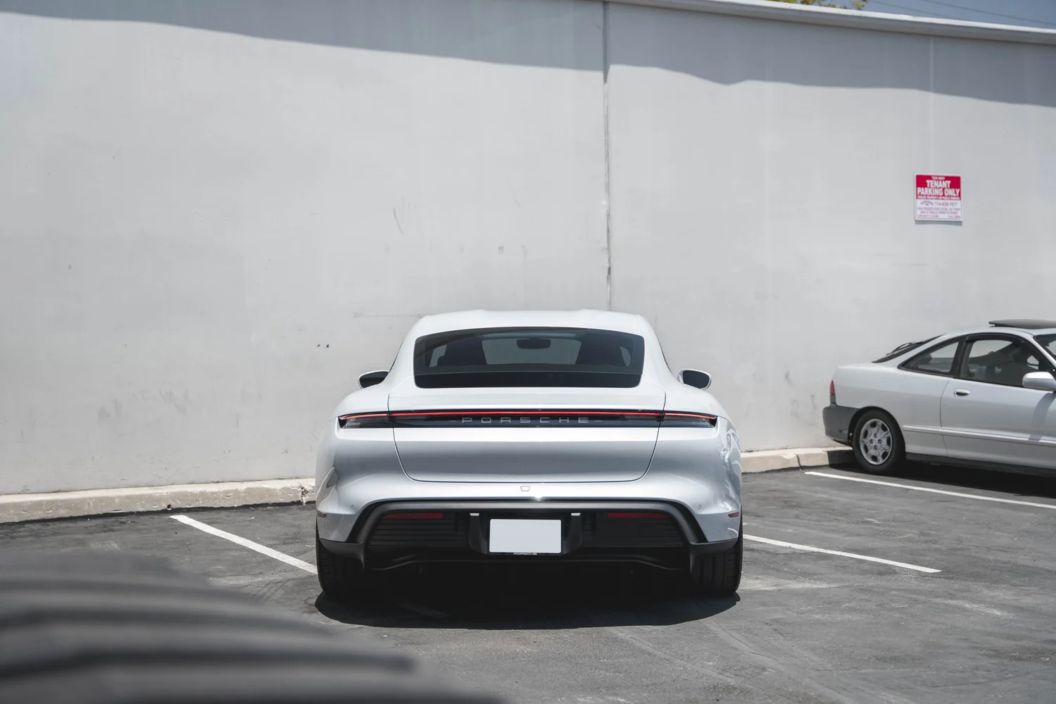 Porsche Taycan after Paint Protection Film (PPF), Window Tint and Ceramic Coating, direct rear view