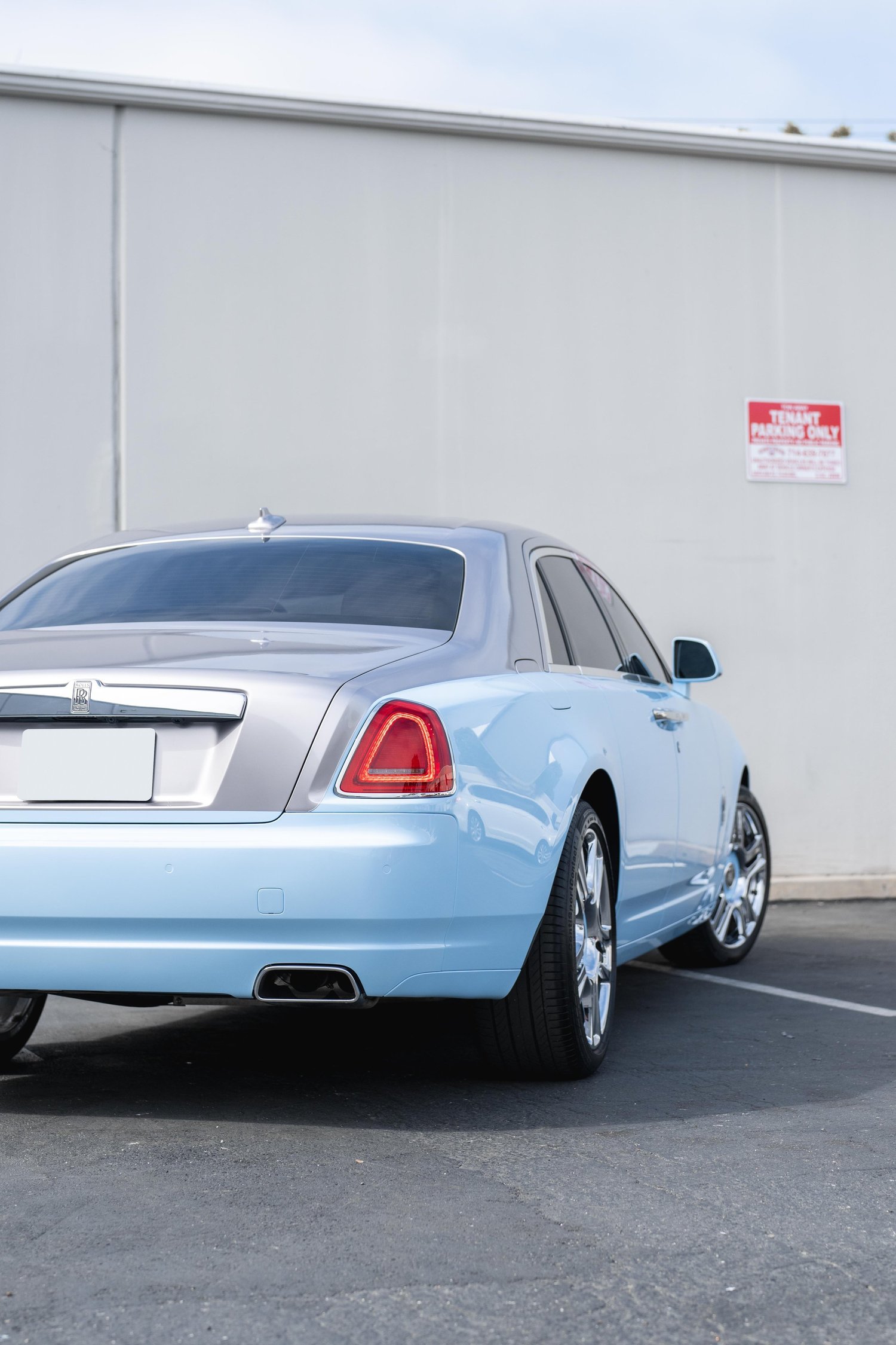Rolls-Royce Ghost after Paint Protection Film (PPF), Window Tint and Ceramic Coating, low-angle rear view