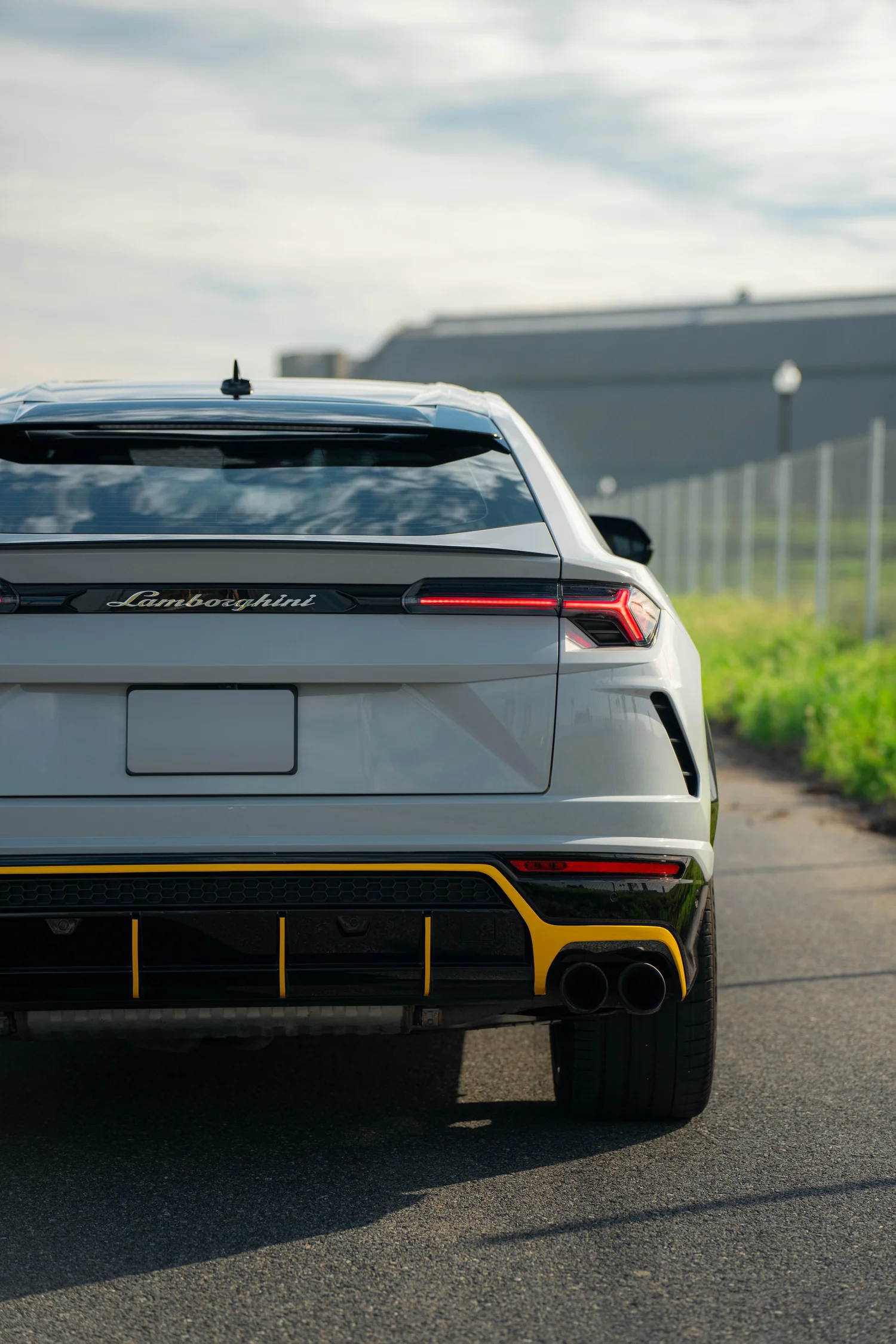 Lamborghini Urus Chalk after Vinyl Wrap, rear body and taillight view