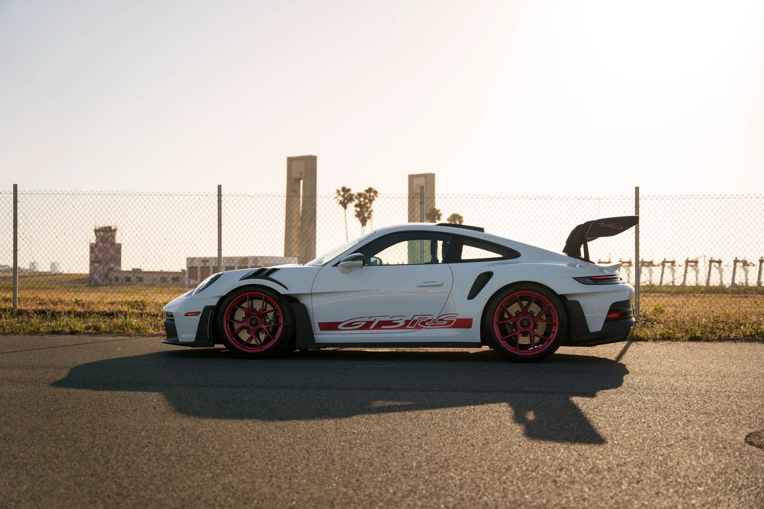 Full side profile of the white Porsche GT3 RS