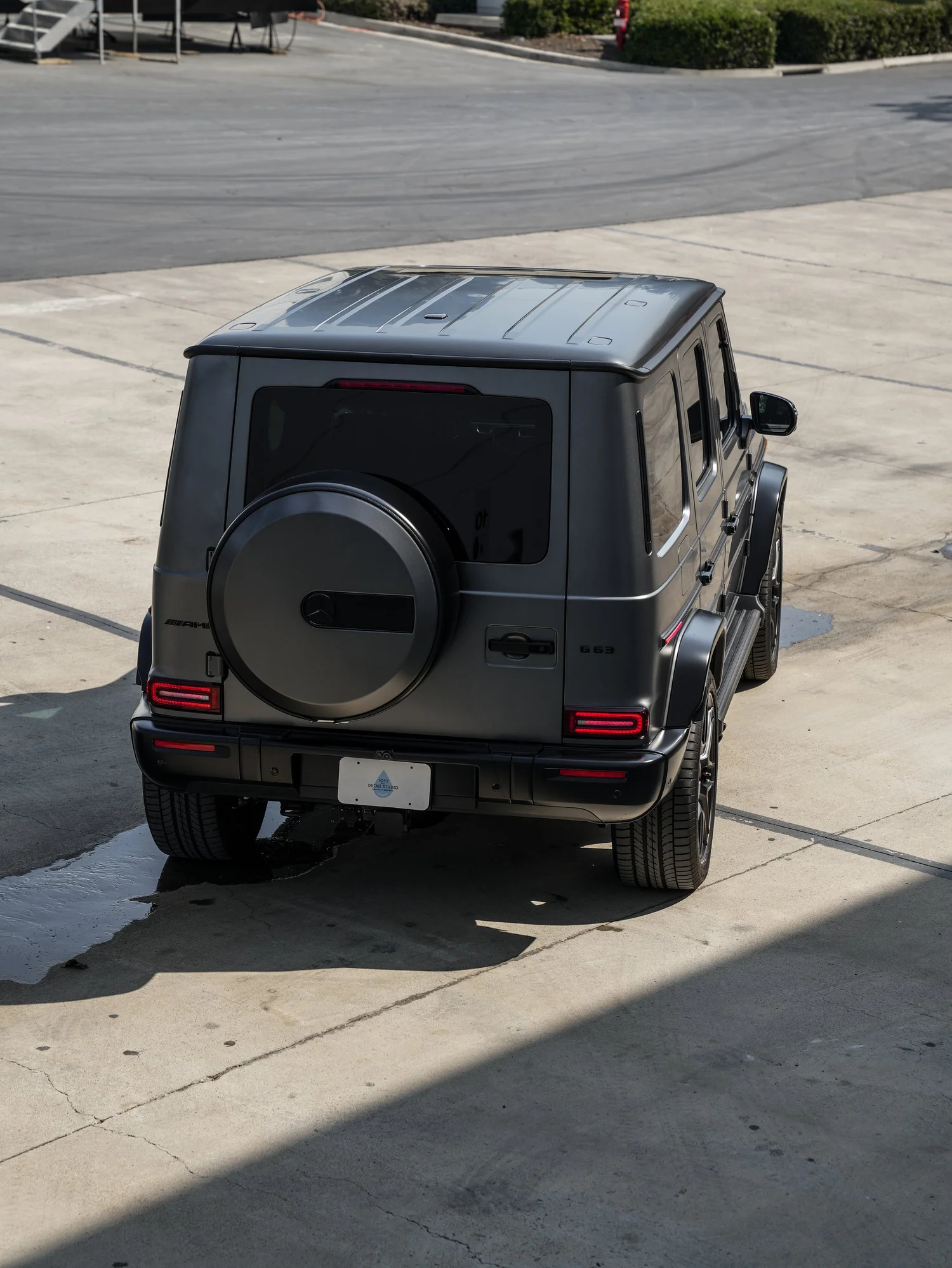 Satin Grey Mercedes-AMG G 63 after Matte PPF, Window Tint and Ceramic Coating, low-angle rear view