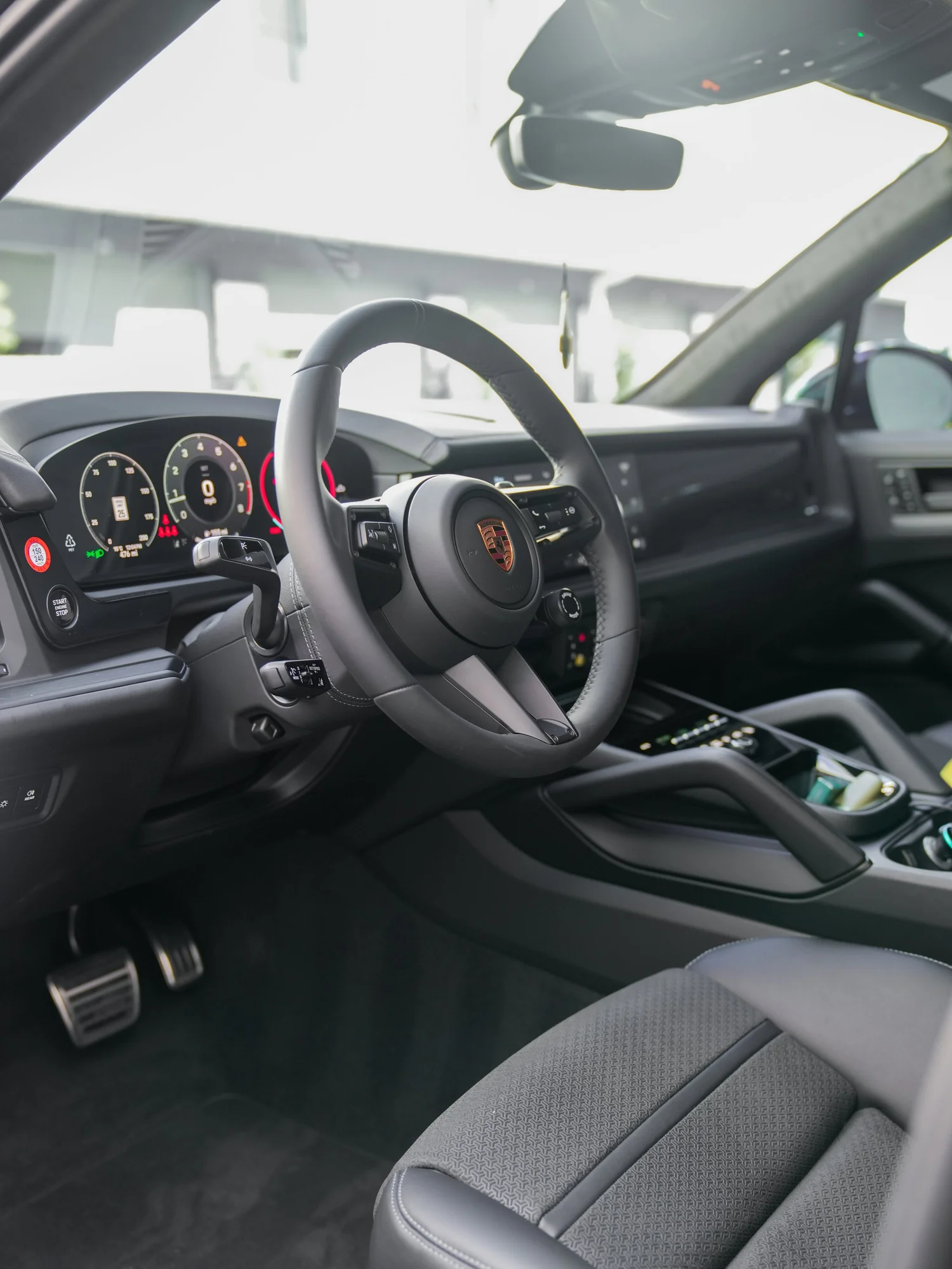 Black Porsche Cayenne GTS after Paint Protection Film (PPF), Window Tint and Ceramic Coating, dashboard and steering-wheel detail