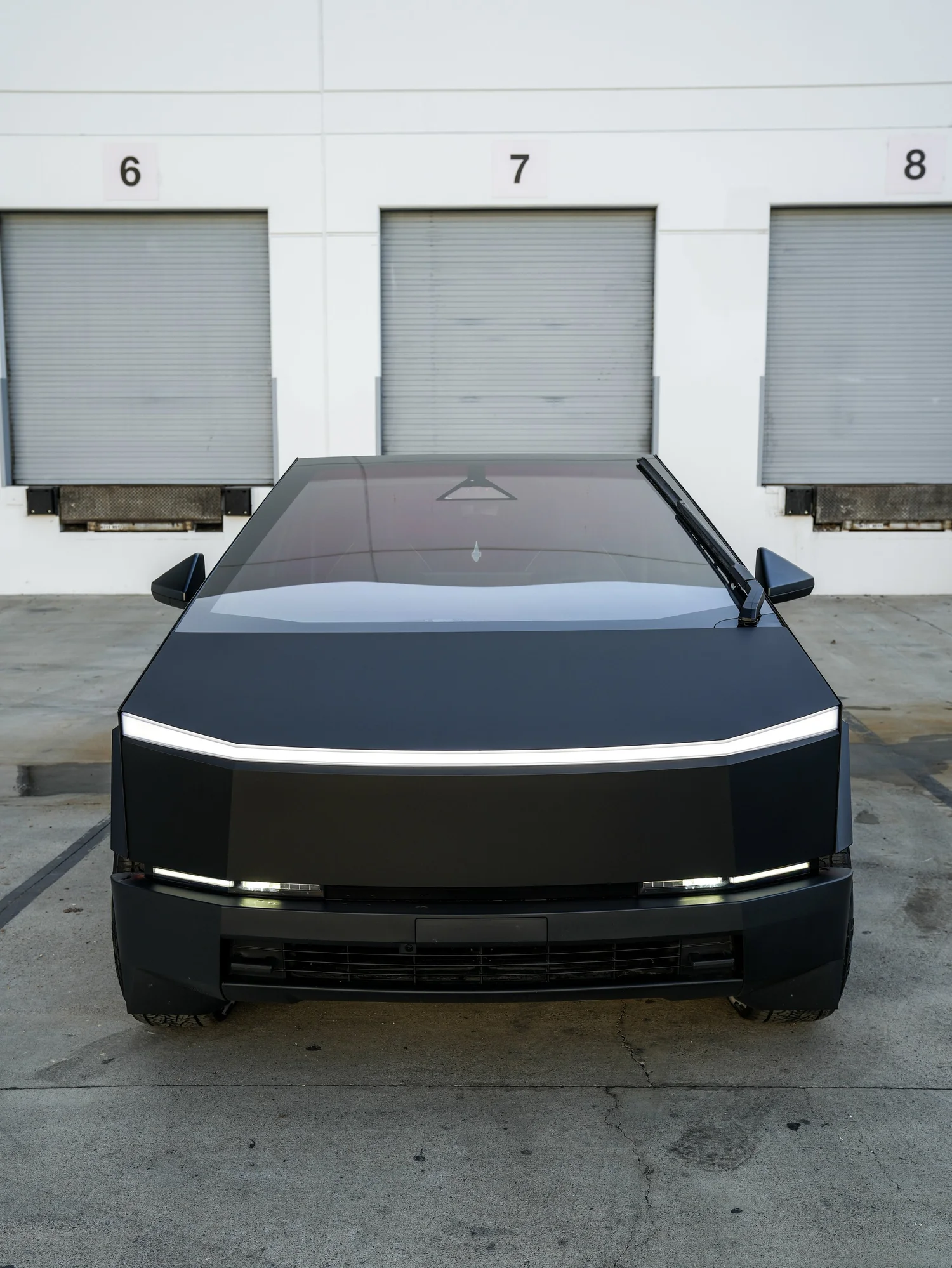 Tesla Cybertruck centered front finished view after PROTEK matte black PPF and window tint