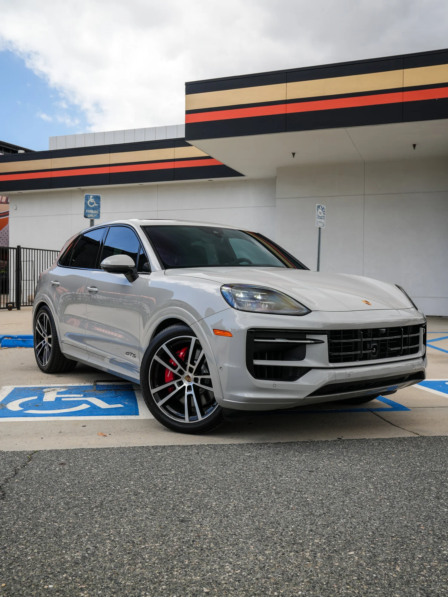 Light Grey Porsche Cayenne GTS after Paint Protection Film (PPF), Window Tint and Ceramic Coating, front-right three-quarter view