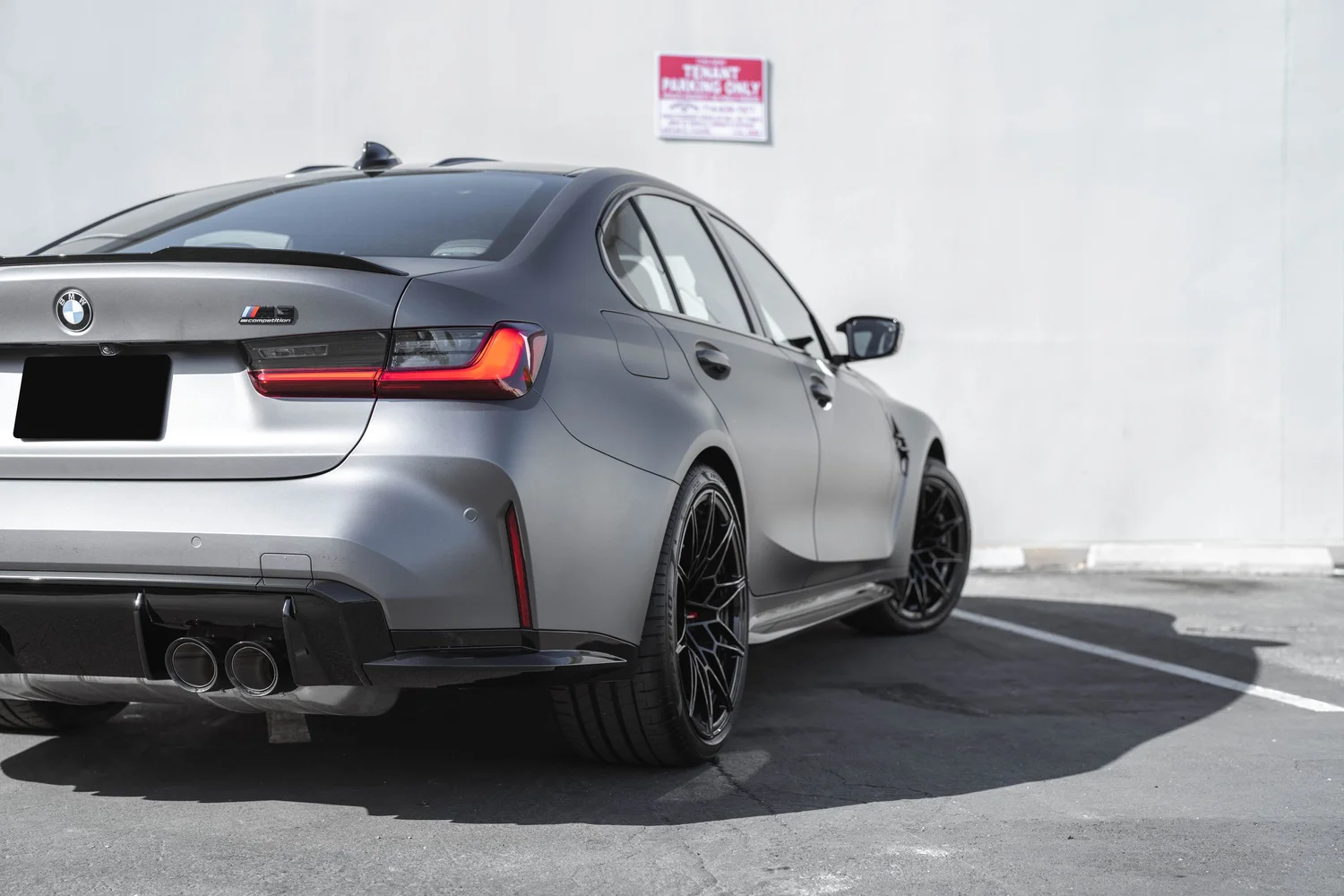 BMW M3 Matte Grey after Vinyl Wrap, rear-quarter and wheel view