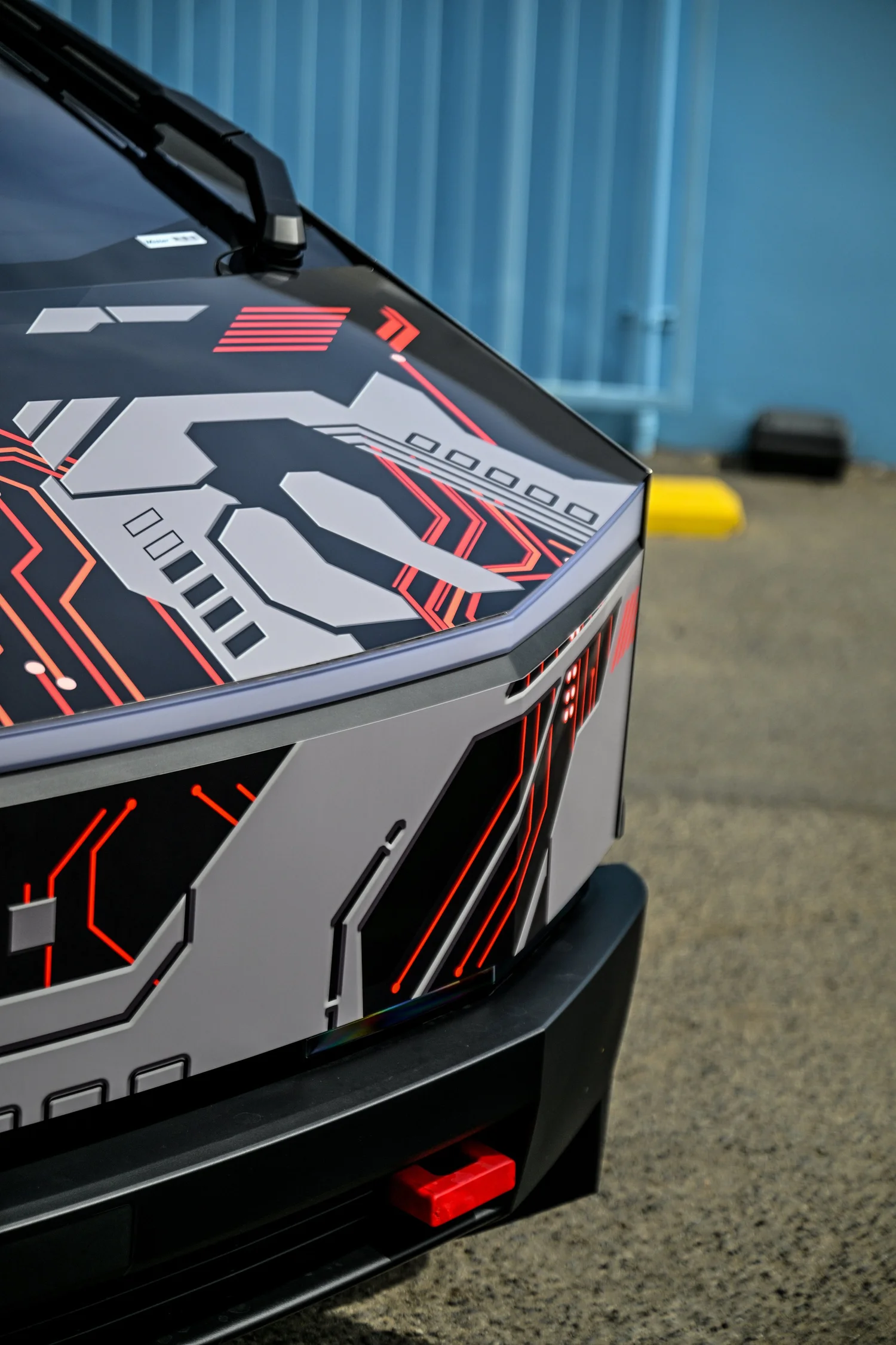 Close-up of custom printed graphics on Tesla Cybertruck body panel