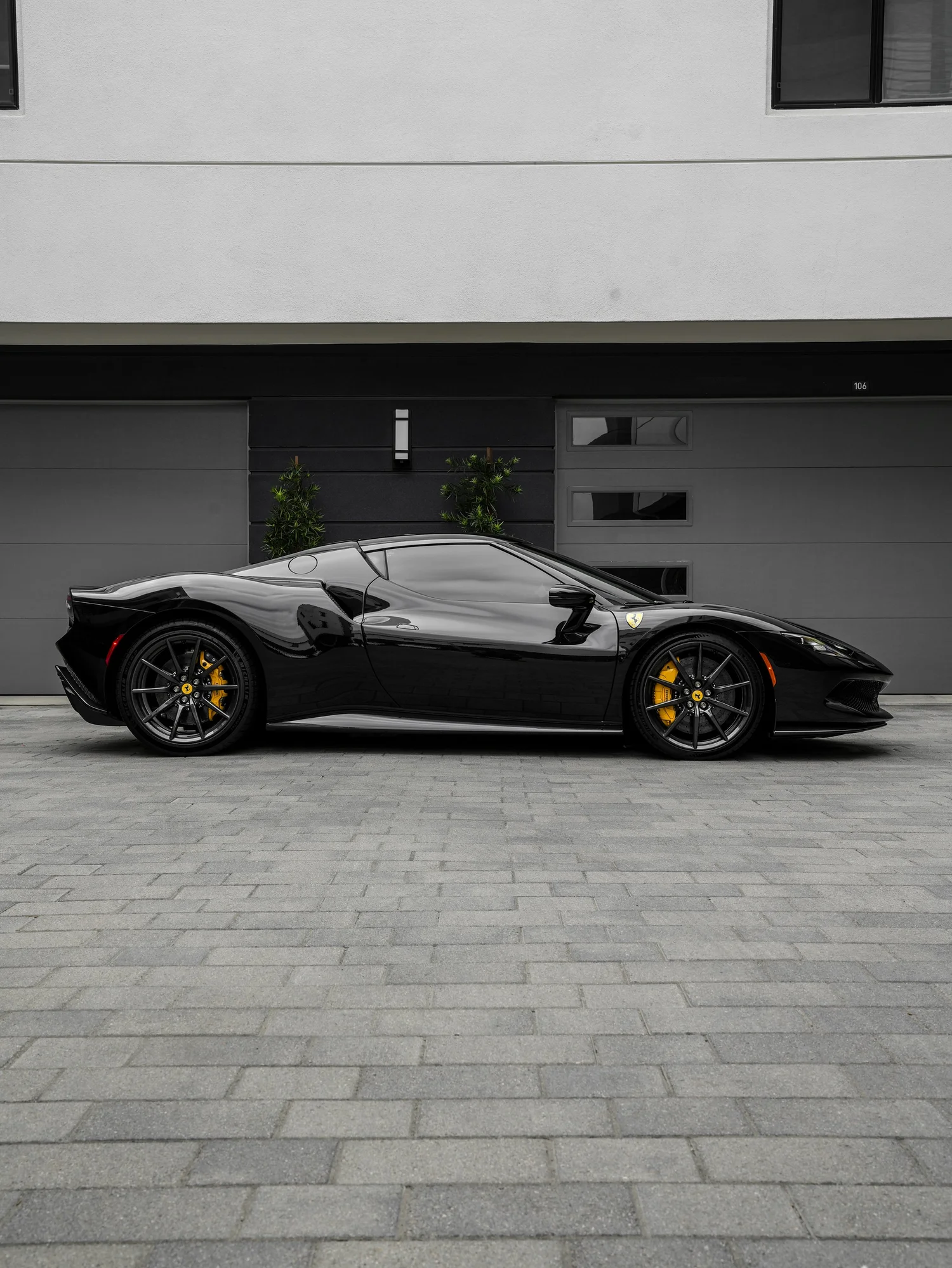 Ferrari 296 GTB PPF & Custom Decals after Paint Protection Film (PPF) and Custom Graphics, wide indoor studio view