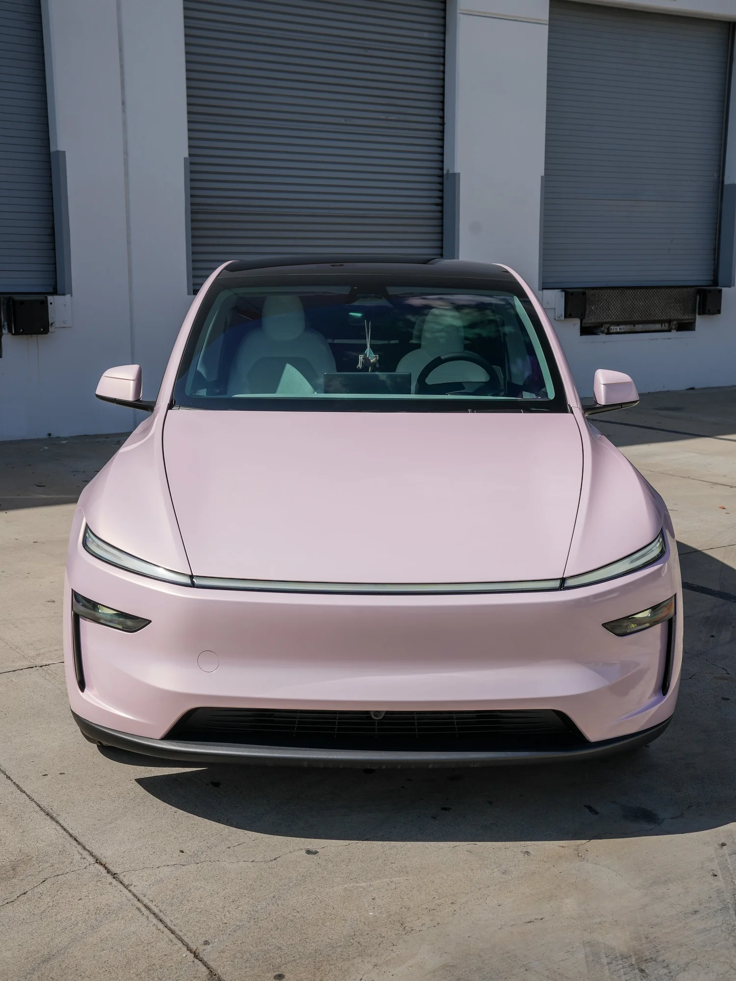 Tesla Model Y Champagne Pink after Vinyl Wrap, direct front view