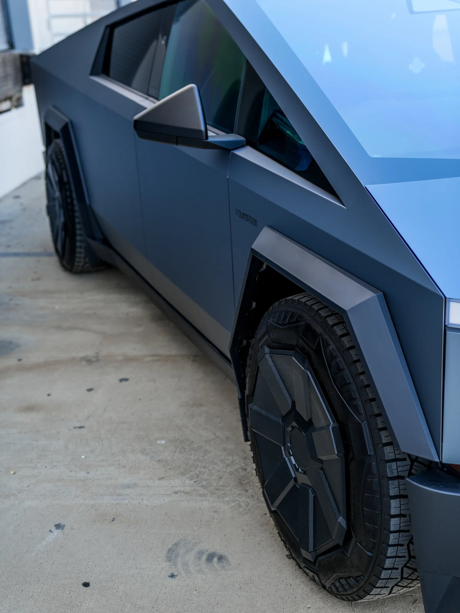 Tesla Cybertruck Ghost Metal Grey Blue after Window Tint and Vinyl Wrap, side body-panel and door detail