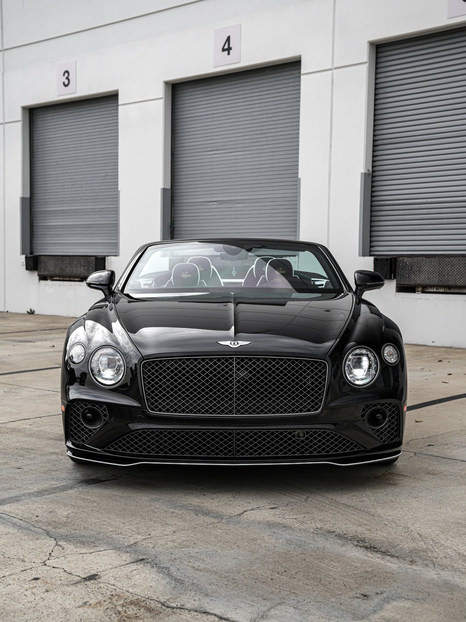 Bentley Continental GTC Film Noir after Paint Protection Film (PPF), Window Tint and Ceramic Coating, low-angle front view