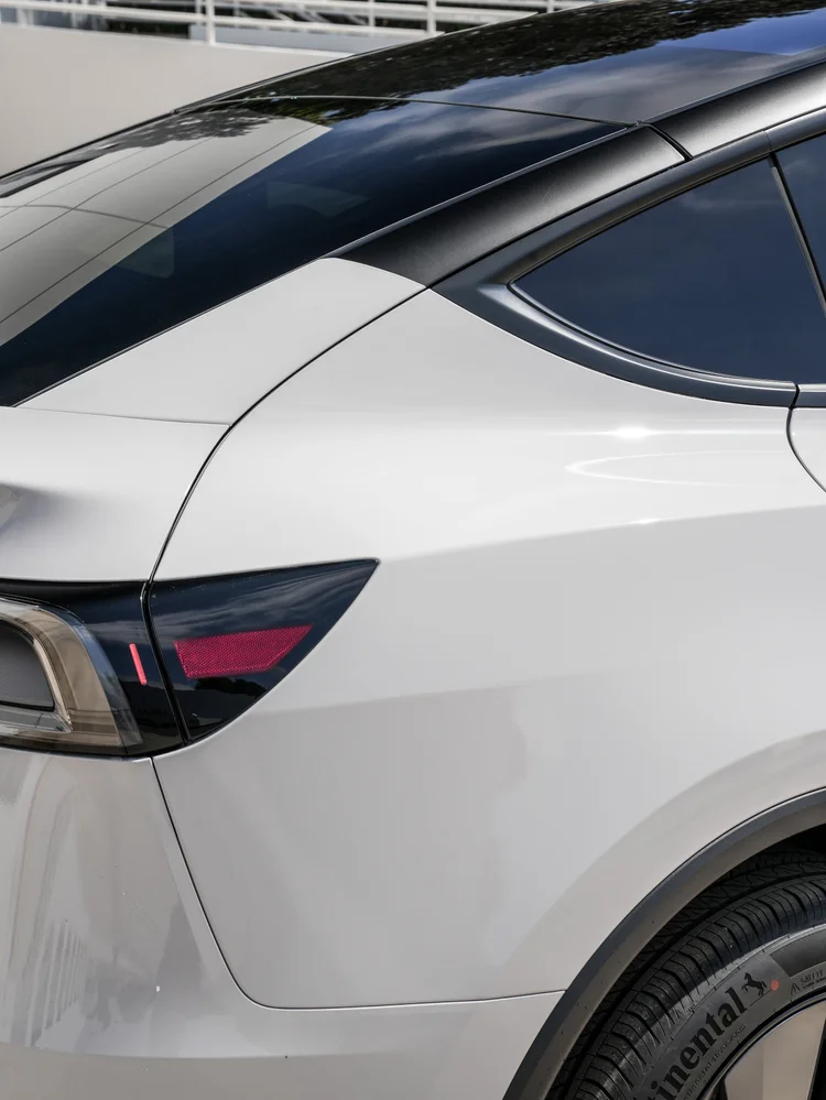 Chalk Grey Model Y rear pillar and black roofline detail