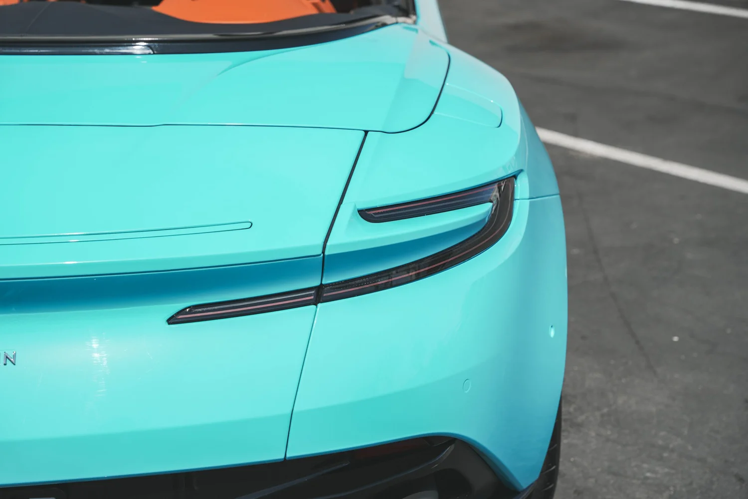 Aston Martin DB11 Miami Blue after Vinyl Wrap, film-edge and surface-finish detail