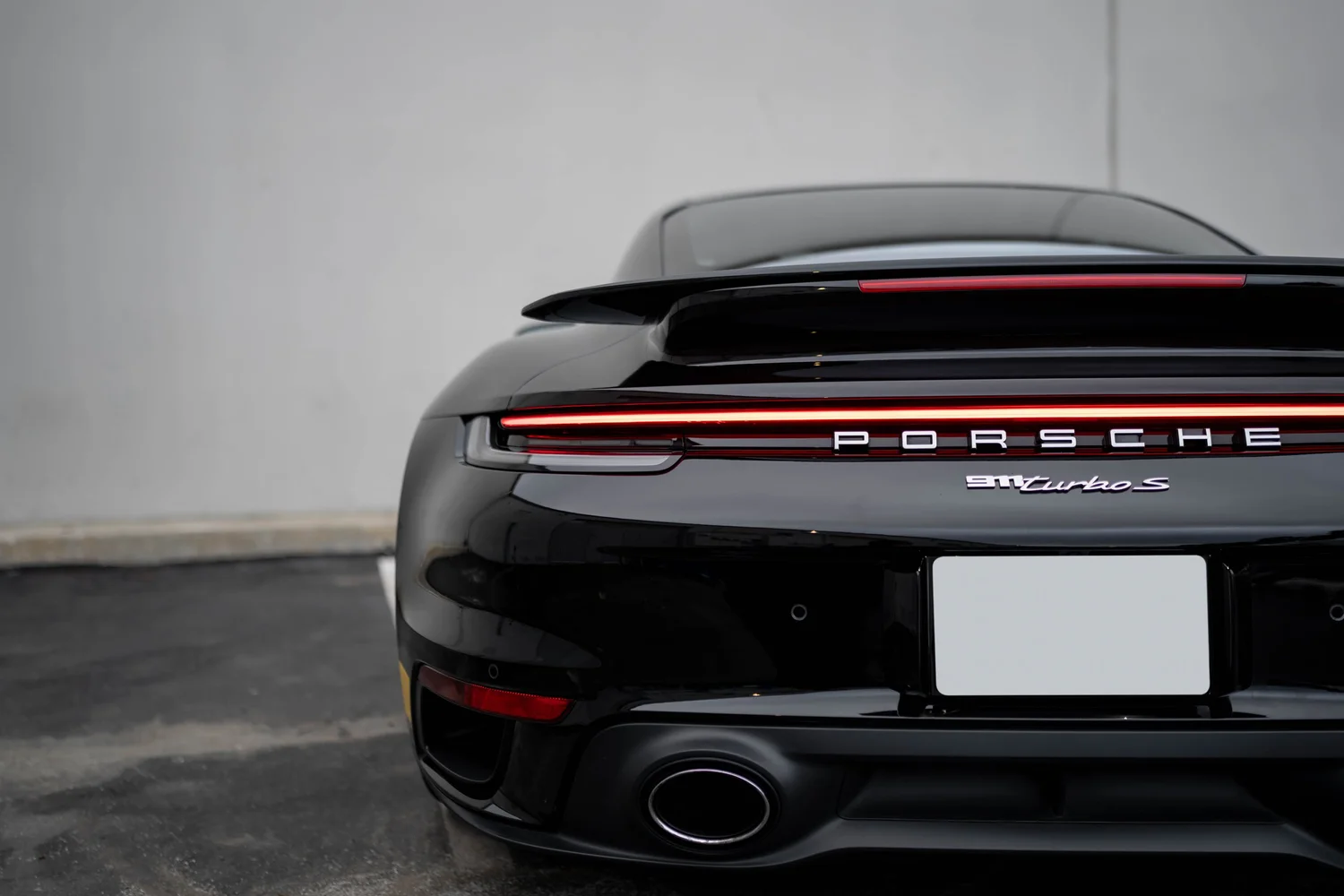 Rear view showing the Turbo S badge and protected finish