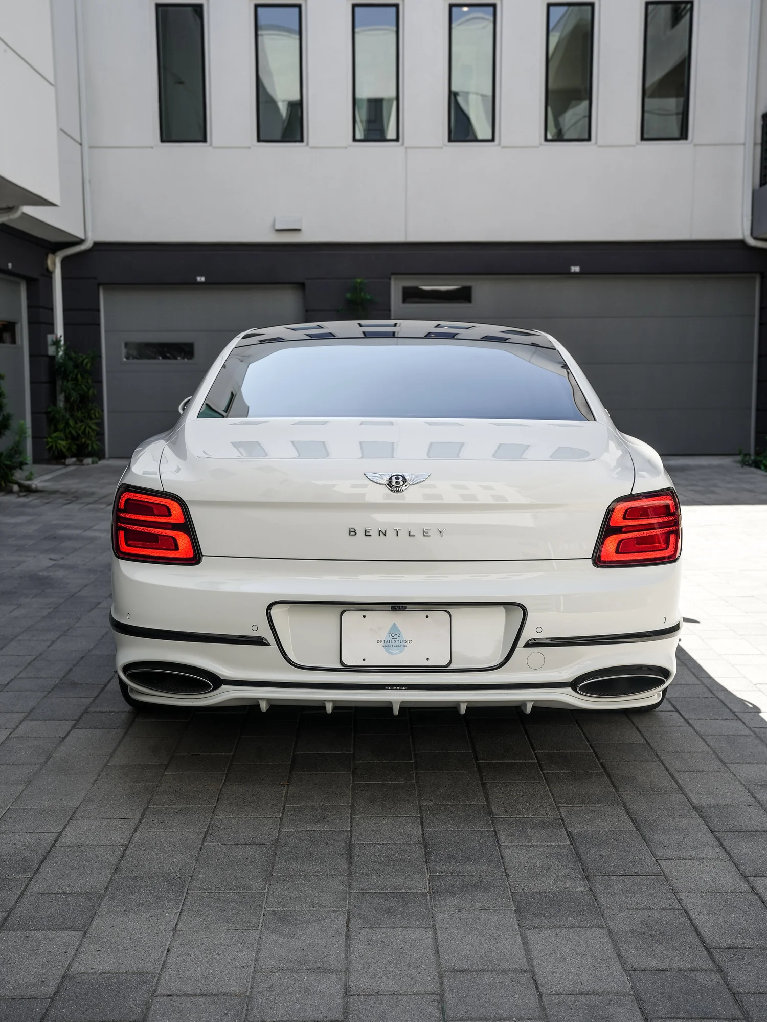 Bentley Flying Spur Speed after Full Body PPF, Window Tint and Ceramic Coating, low-angle rear view