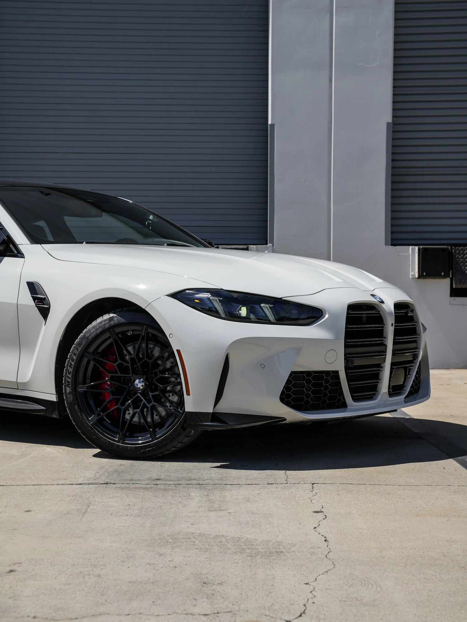 BMW G82 M4 after Paint Protection Film (PPF), front-right three-quarter view