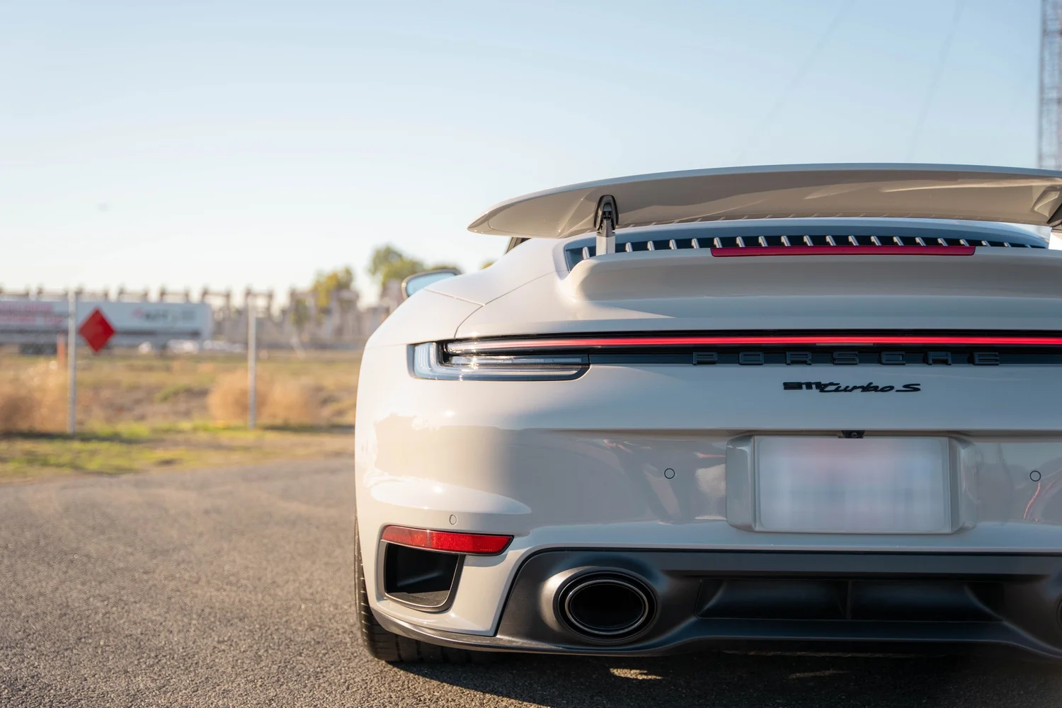 Chalk Porsche 911 Turbo S after Paint Protection Film (PPF), Window Tint and Ceramic Coating, rear bumper and taillight detail